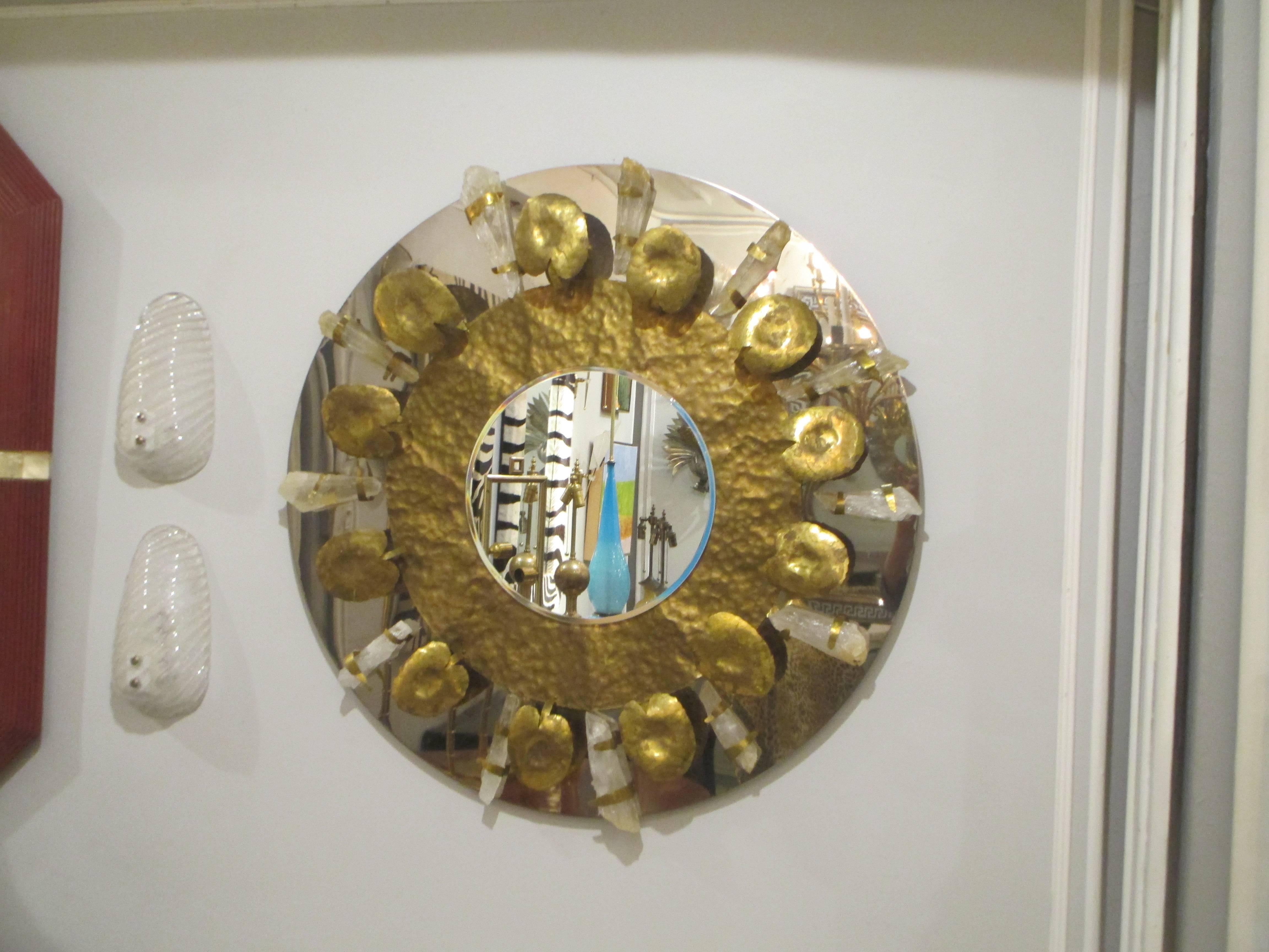 Unusual hand-hammered brass and quartz mirror.