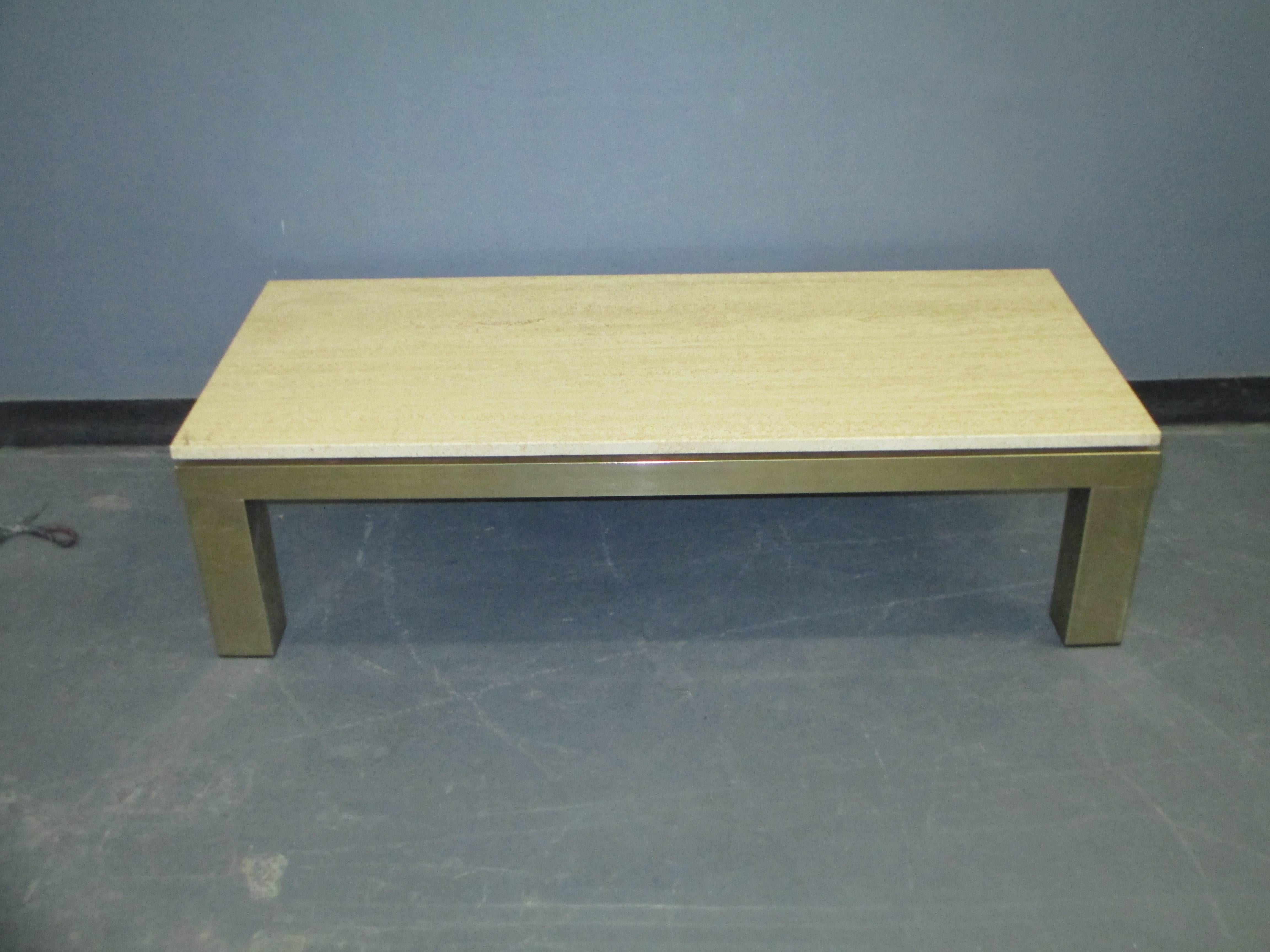 French Mid-Century Modern travertine-top coffee table on brass base.