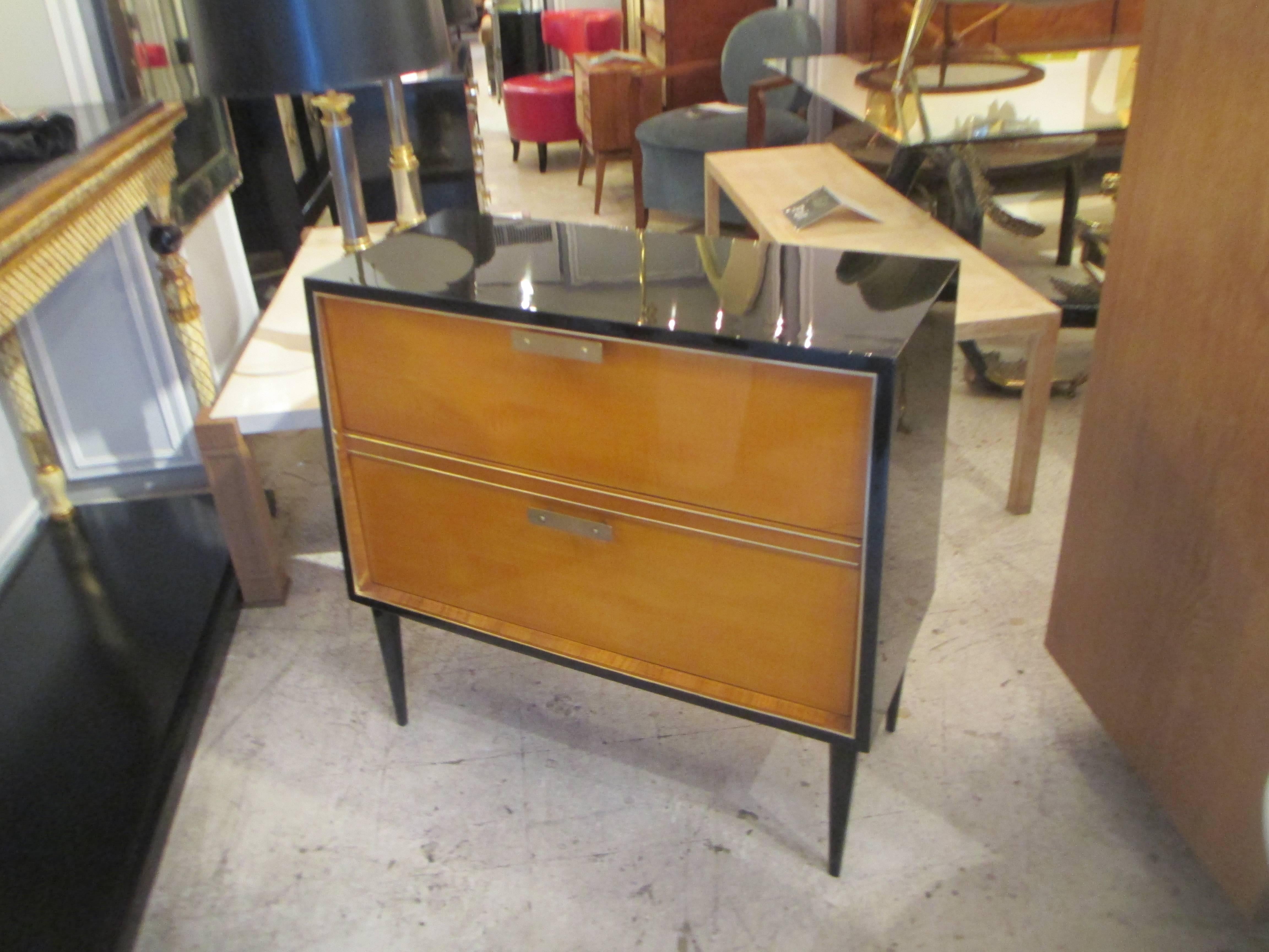 Italian Mid-Century lacquered chest with bronze banding.