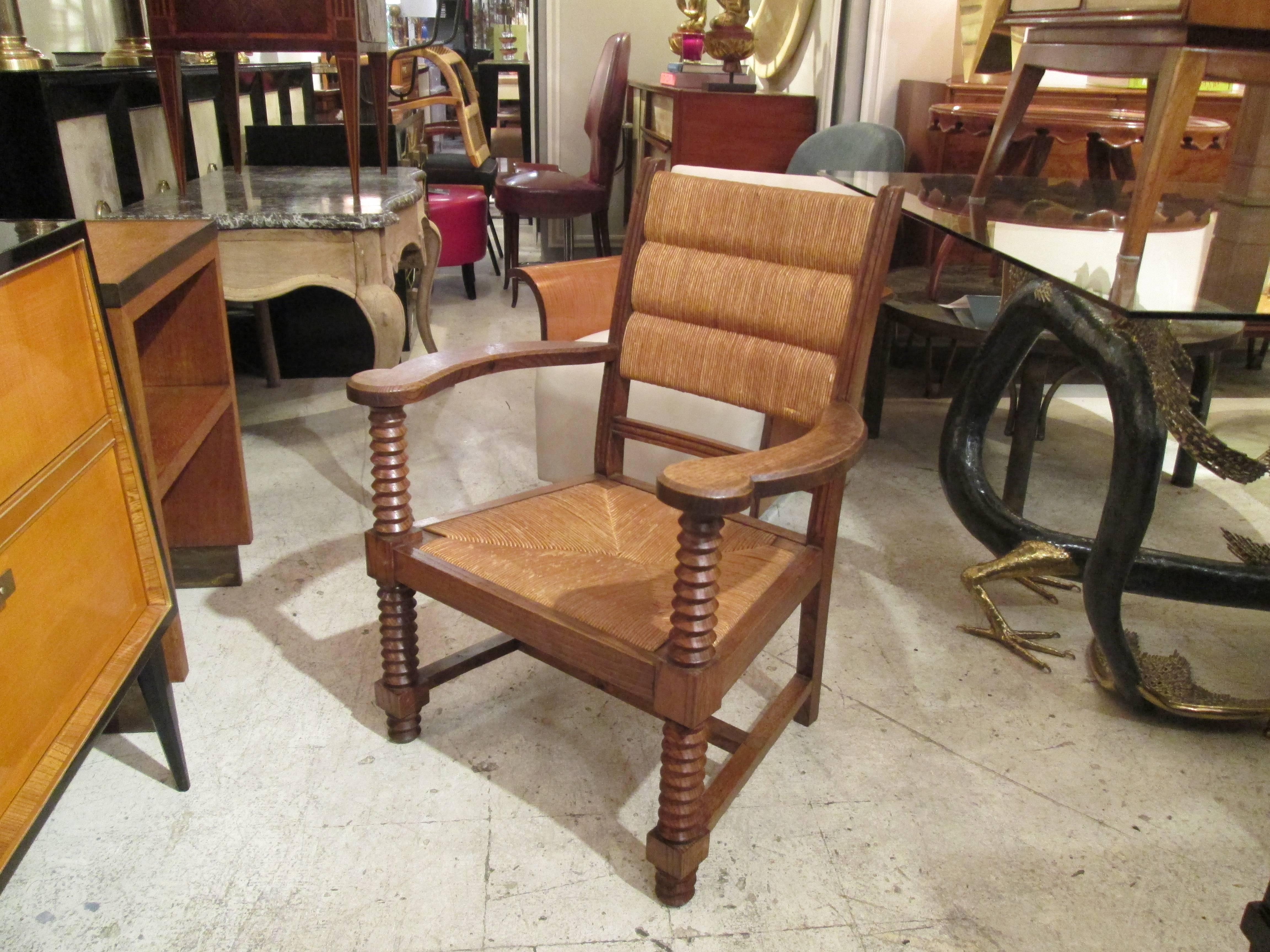 Unusual pair of caned, oak armchairs with barley-twist arms and legs, French, 1940s-1950s.