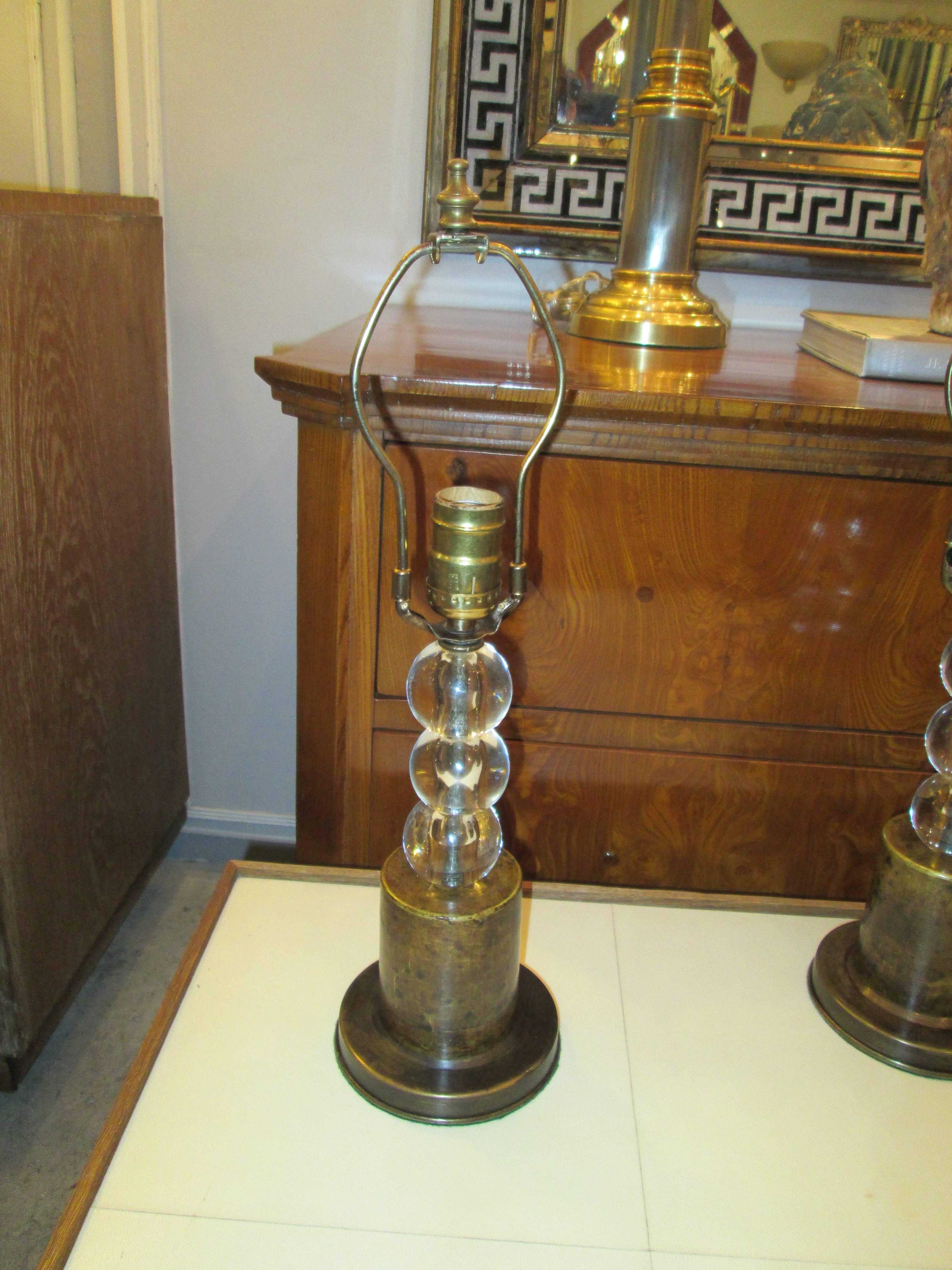 American Pair of Boudoir Lamps with Crystal Orbs on Brass Base For Sale
