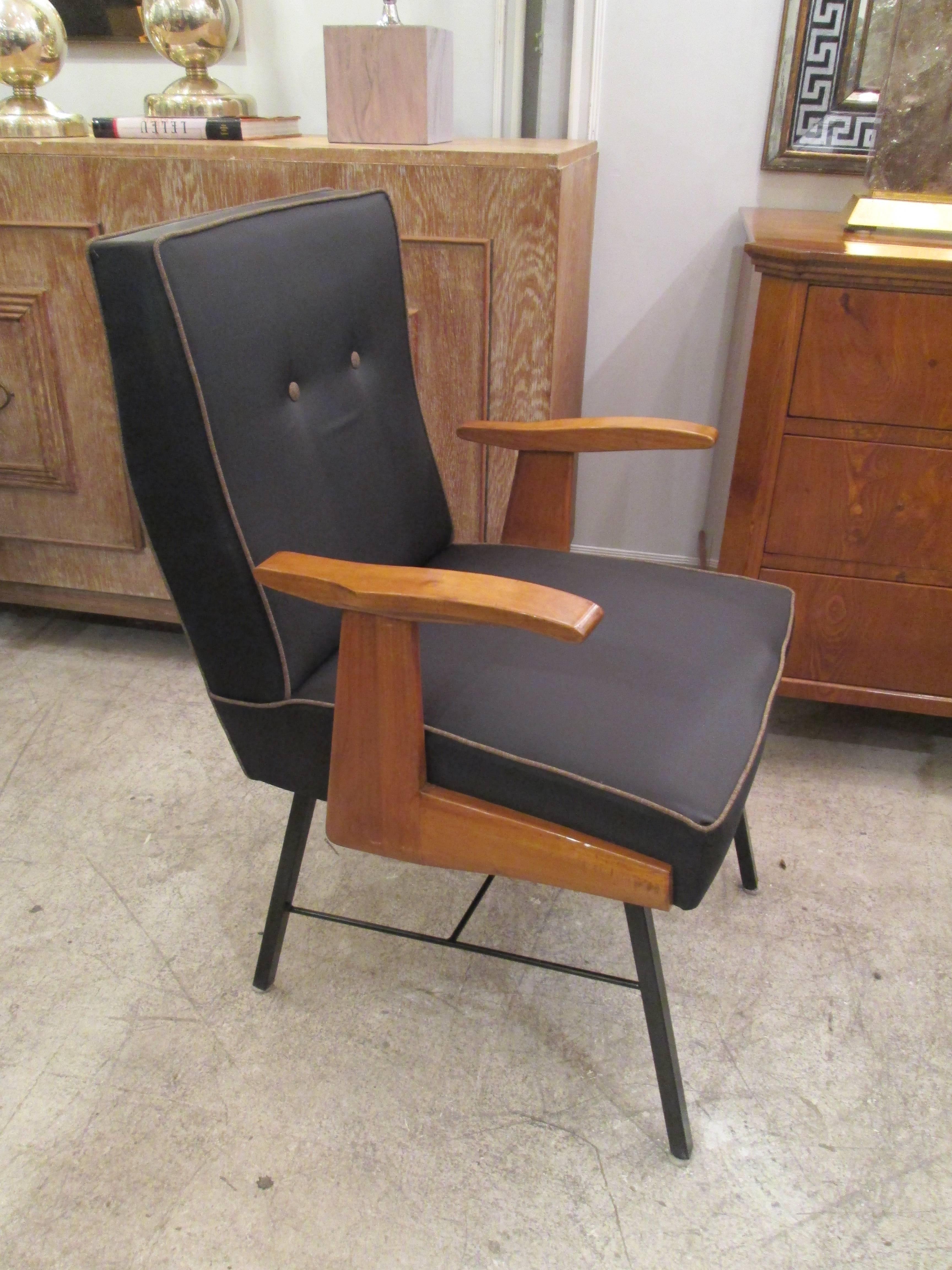 A pair of Mid-Century Italian armchairs on iron base upholstered in horse hair.