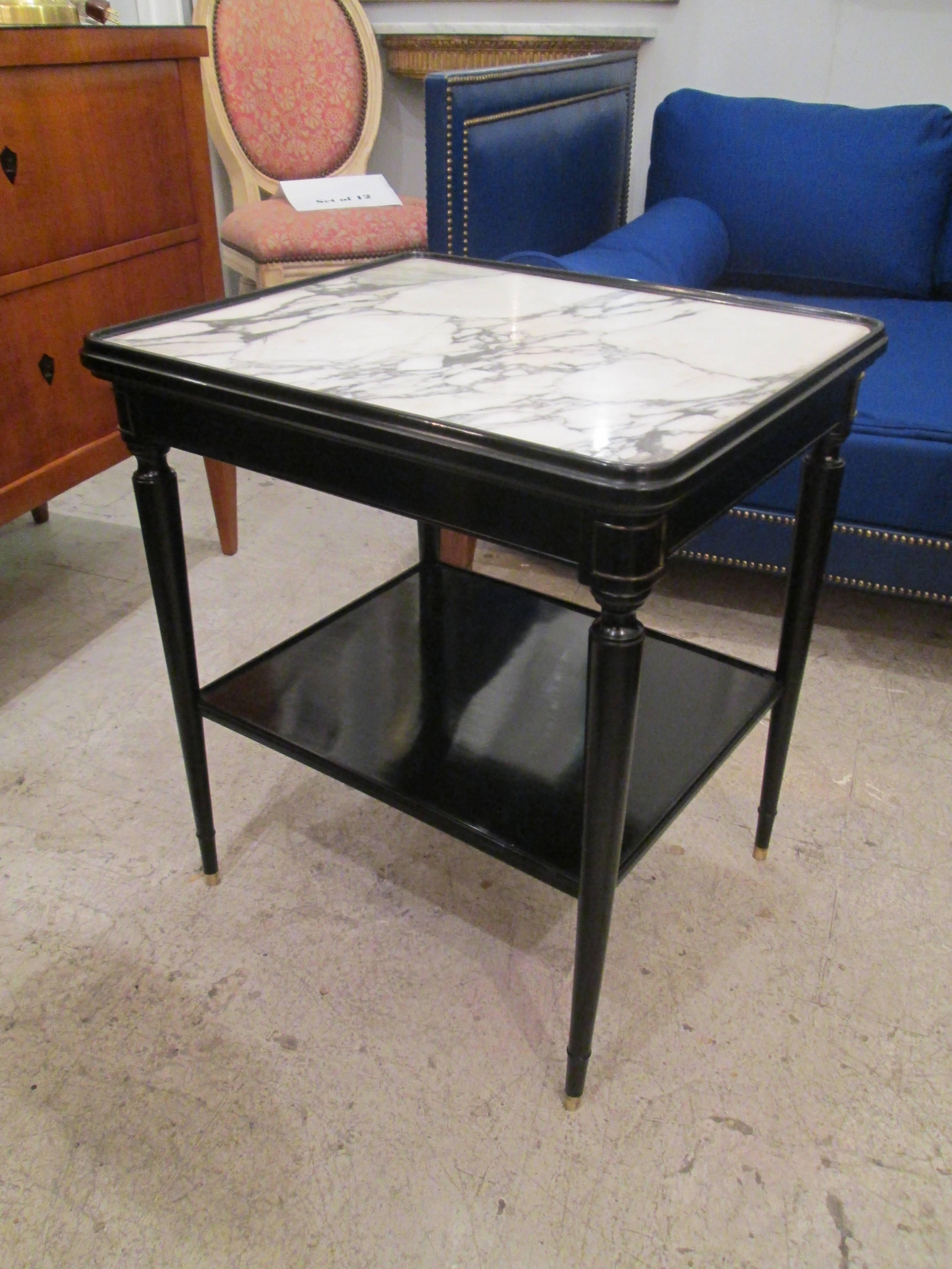 Pair of  French Ebonized Marble-Top Nightstands With Shelves.