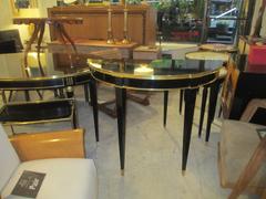 Pair of French 1940s-1950s Ebonized Demilune Consoles