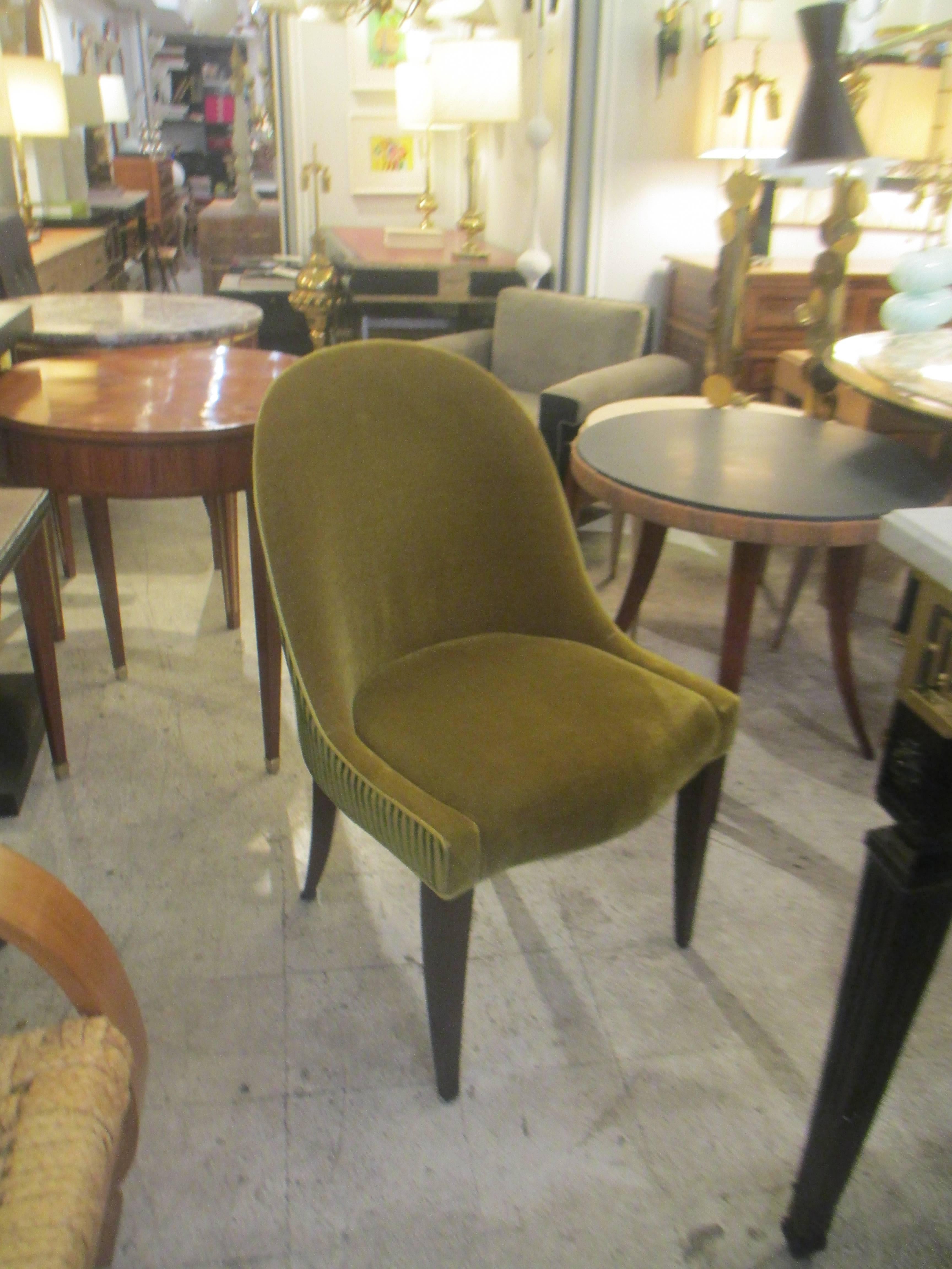 Set of eight dining room chairs with scooped backs upholstered in mohair, extremely comfortable.