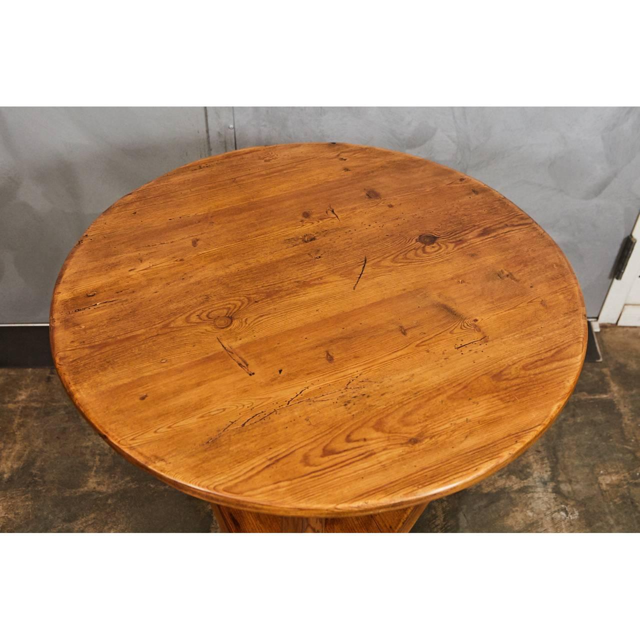 This nicely crafted cricket table has a nice color with original signs of age and use. The legs are three sided. These tables were used on the cricket fields for their light, sturdy construction and are popular to this day for a variety of