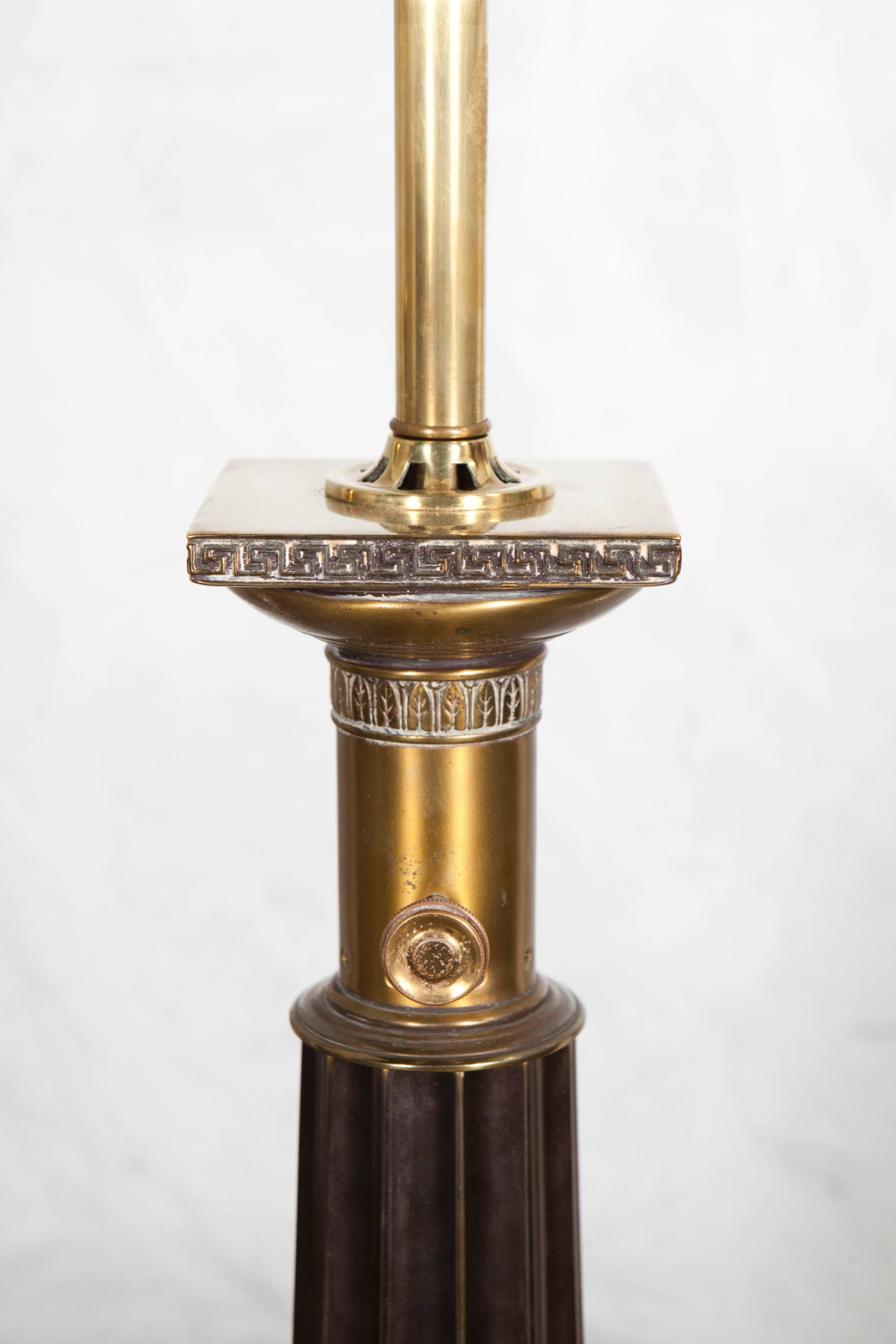 These handsome brass column lamps have leaf and Greek key patterns details and a distinguished Mid-Century Modern aesthetic. The lamps have been recently re-wired and are ready for installation and use.