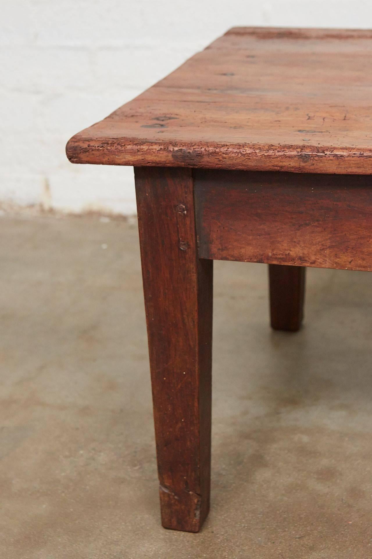 This table is of a good size and a wonderful color. The table has two small drawers on each side. Signs of age and wear indicate that this table is a very special piece of 19th century French country furniture.