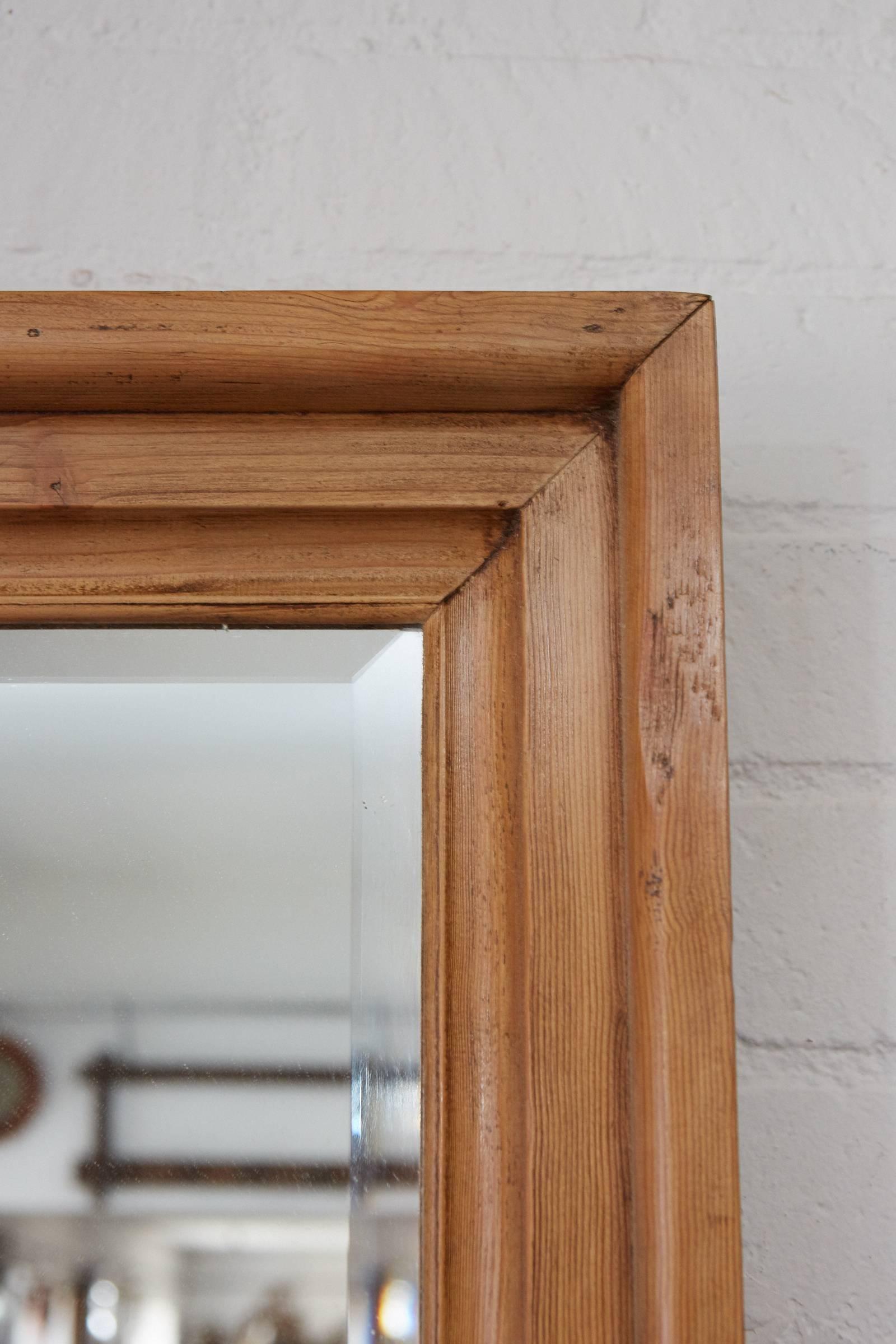This English pine frame is over three feet tall, has a nice light color and a clear beveled mirror. This piece is well suited for a variety of settings and is ready for installation and use.