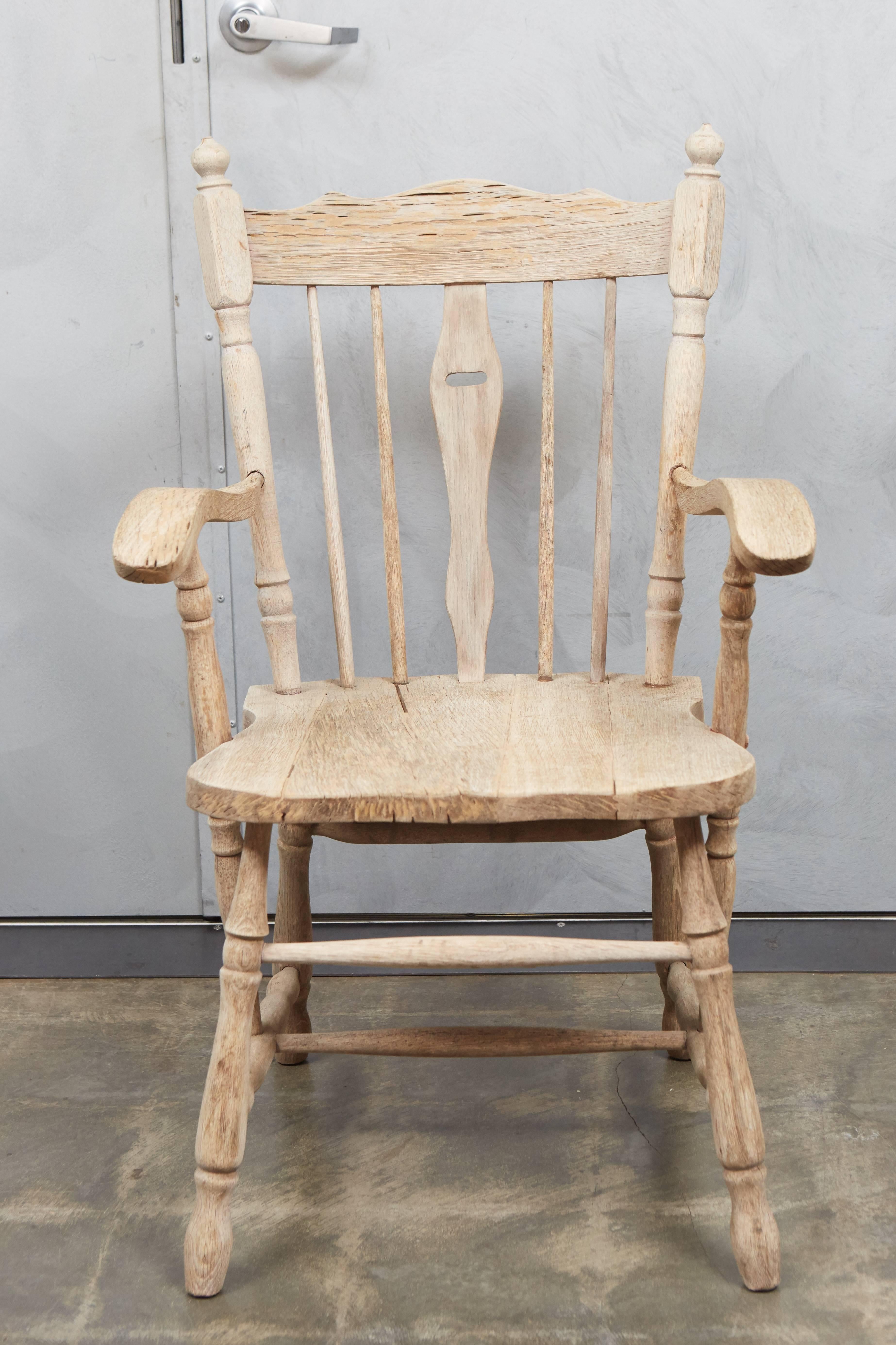 These bleached oak armchairs are beautifully turned and carved for a rustic yet distinctly delicate design. 

 