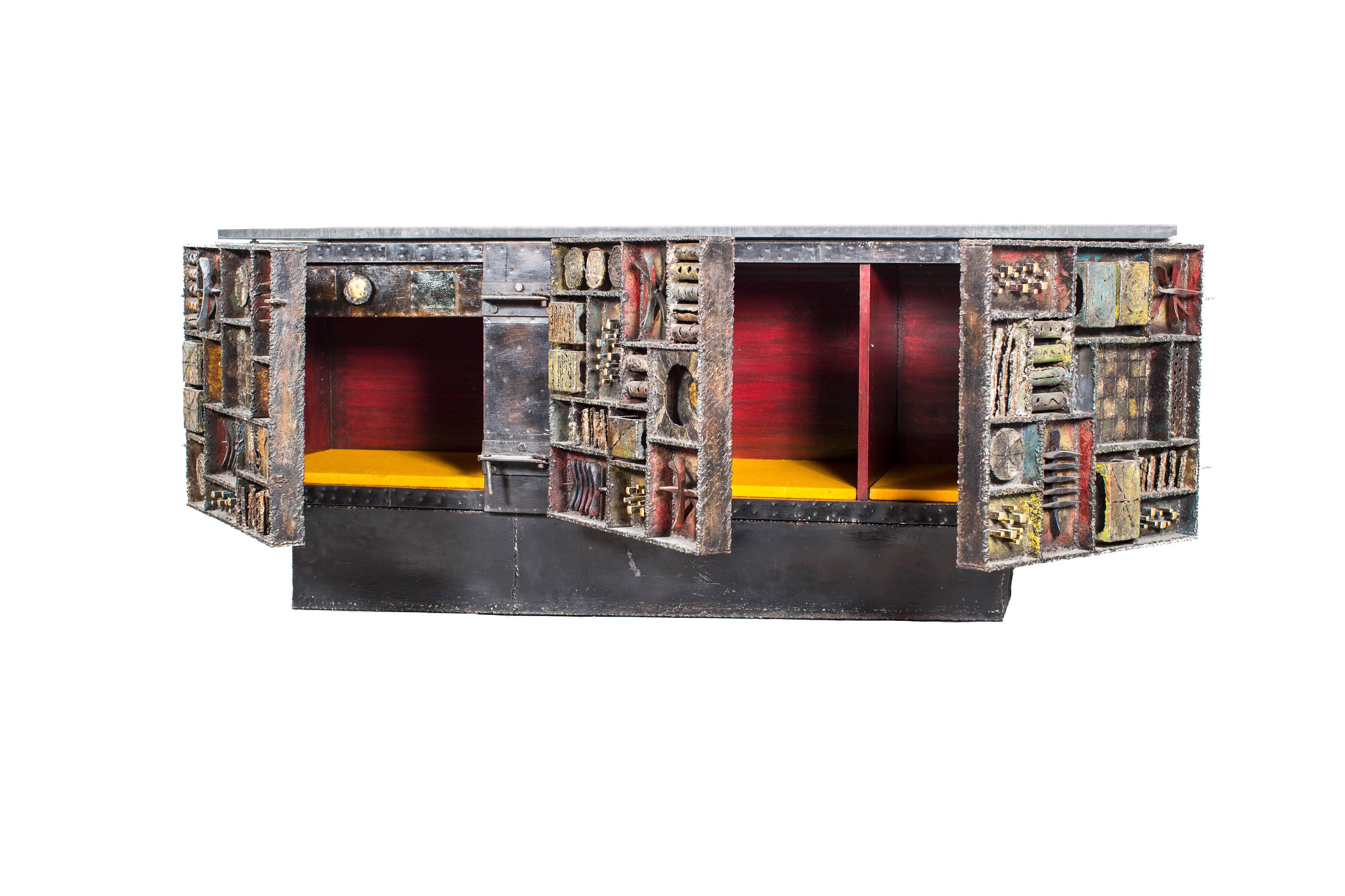 Welded, torch-cut and polychromed steel, bronze and slate top front cabinet by Paul Evans, 1968, welded signature under door (Paul Evans 68 D.R.).