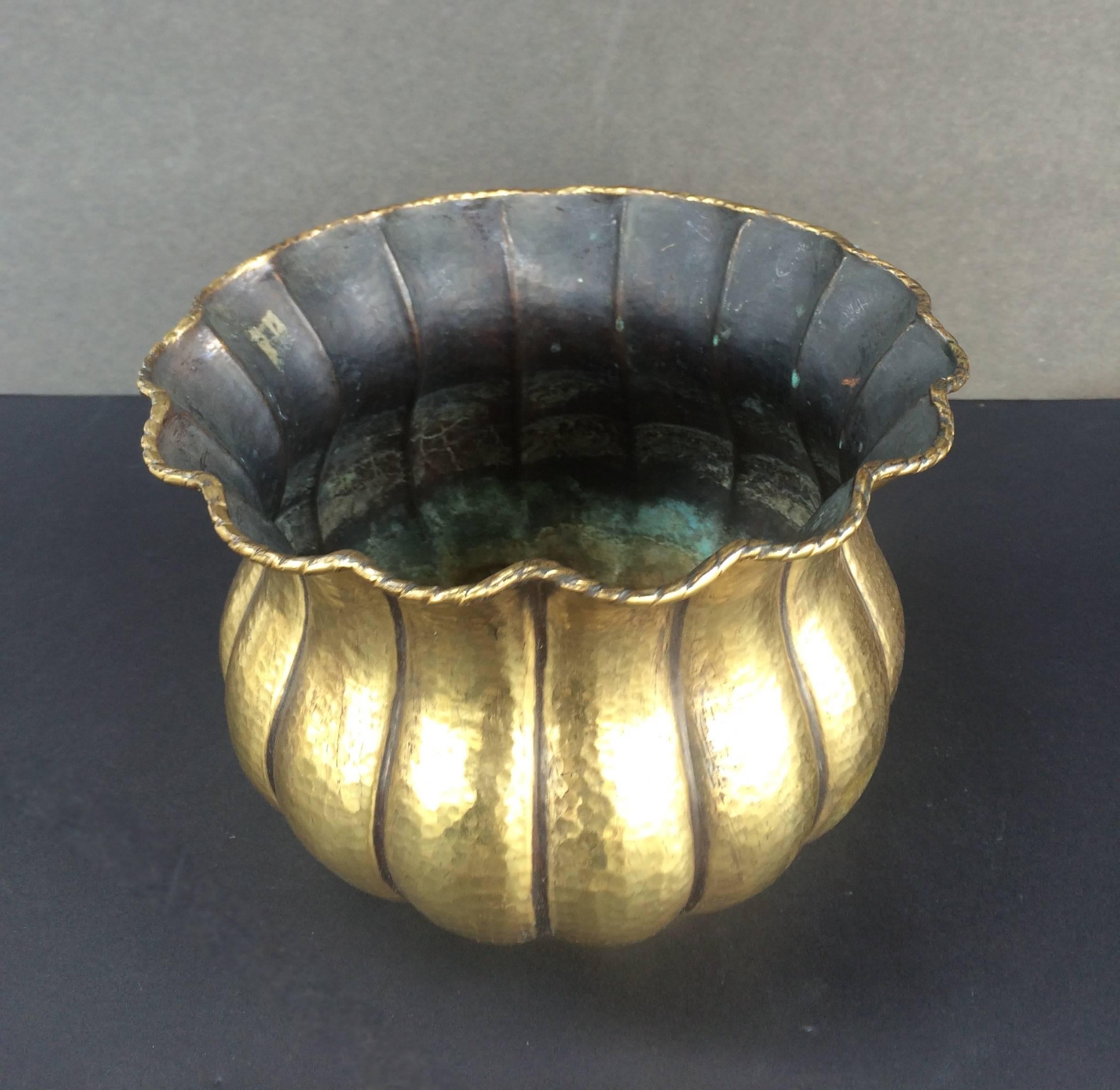 Fluted Bowl
hammered brass
stamped Italy underneath
circa 1950s
9.75 in diameter  x 7.5 ins high