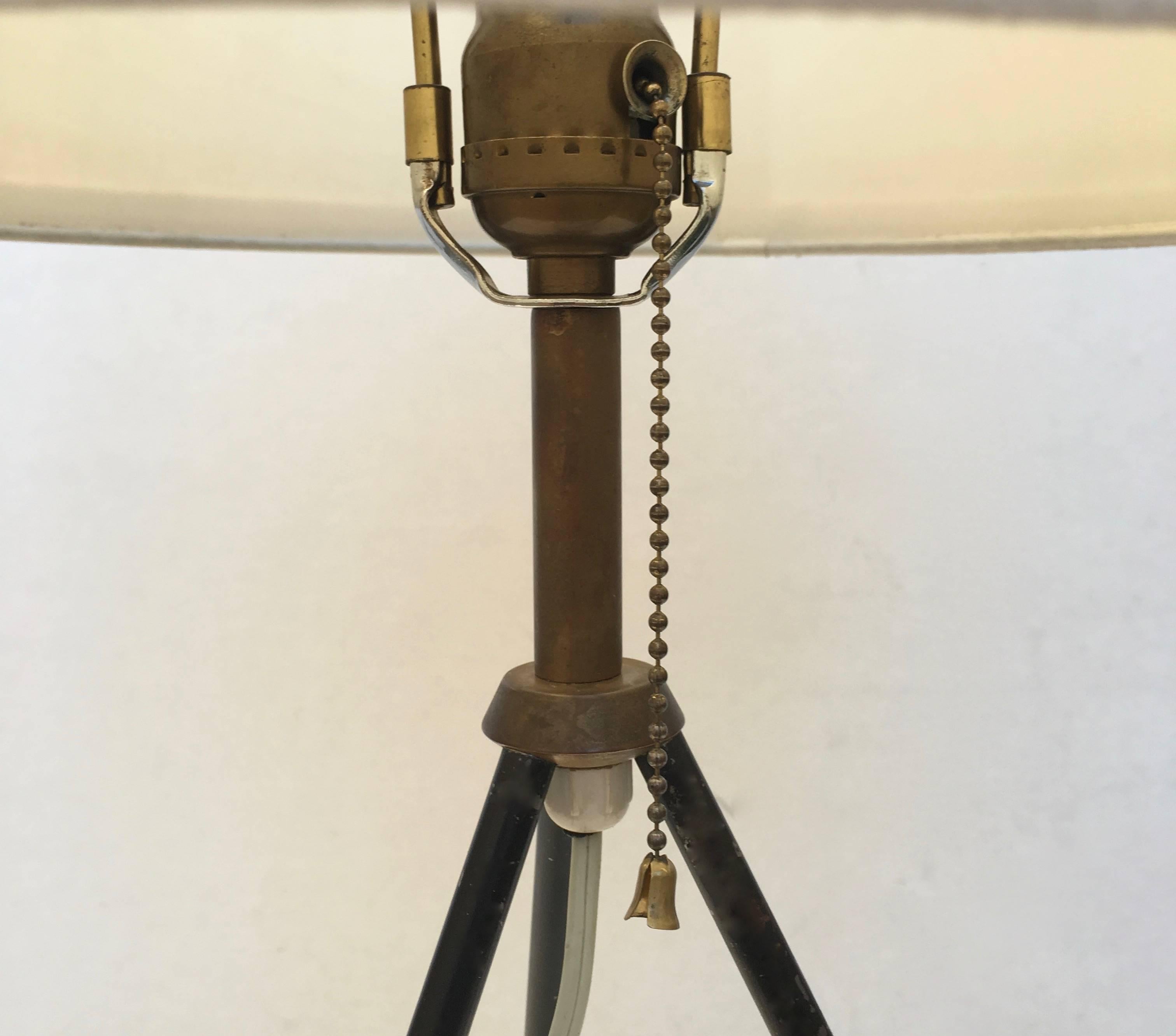 Midcentury Tripod Lamp
circa 1950s
Painted steel, brass
23 high with shade, 11 inches in diameter
Good condition, wear to paint