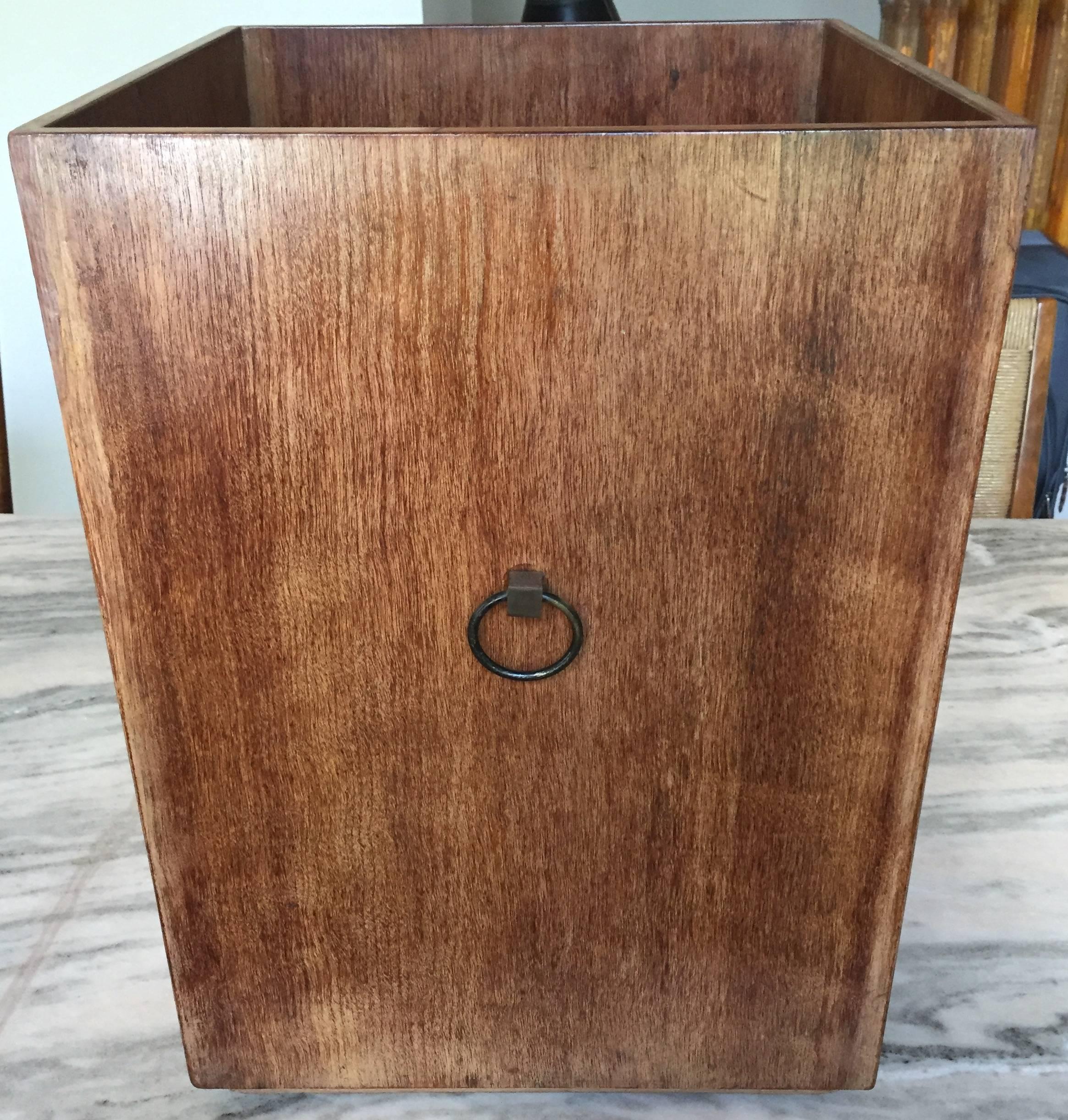 Walnut wastepaper basket with two brass ring handles from a 1938 custom Manhattan NY interior by Robsjohn-Gibbings. This is part of a library suite we acquired directly from the descendants of the couple who commissioned Gibbings to custom furnish