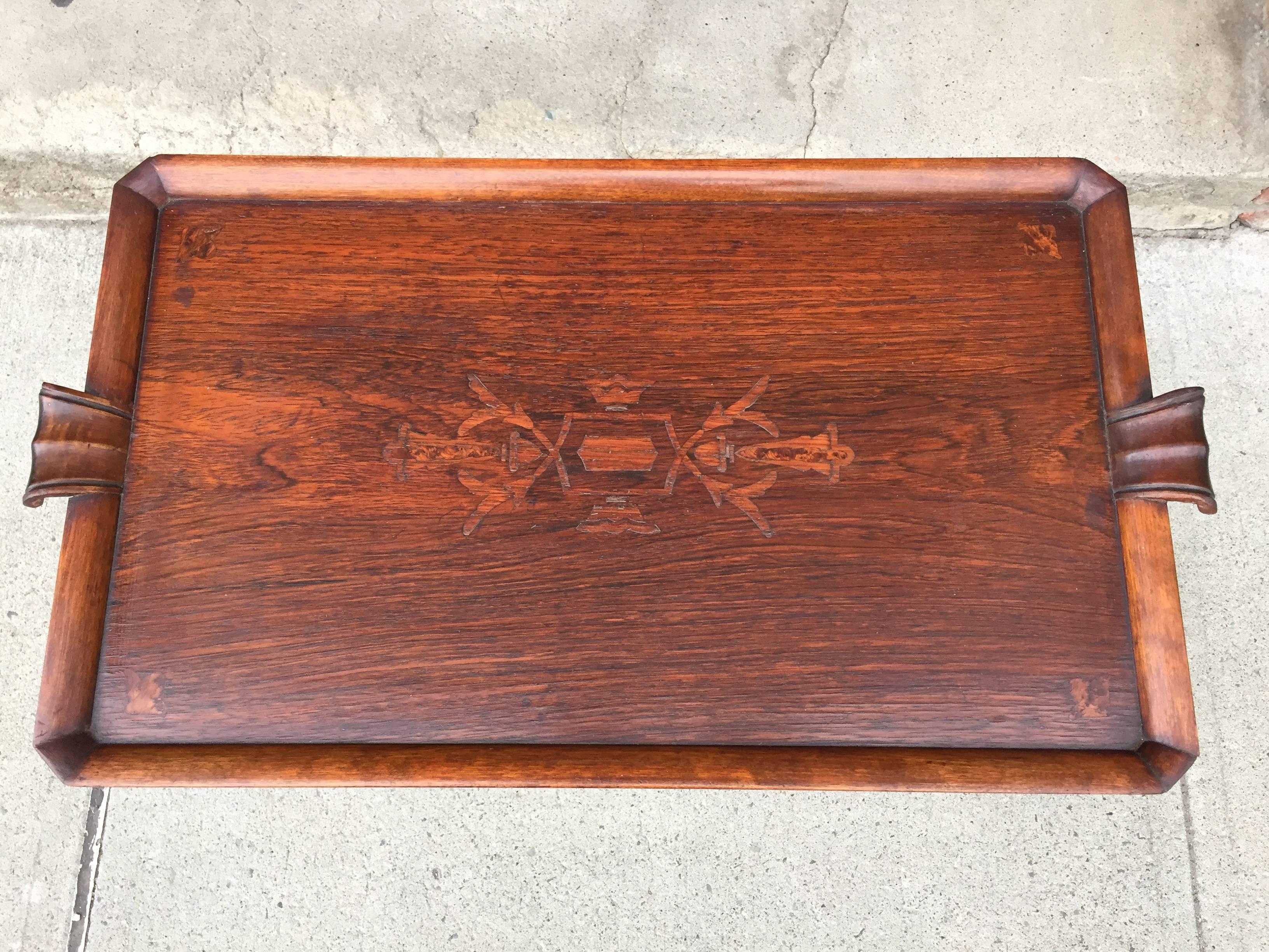 Graceful solid oak table with various inlaid wood decoration on the tray-form top. Nordiska Kompanient metal tag to underside dates the table to 1926-1927, during Bergsten's tenure as house furniture designer at the prestigious Swedish department