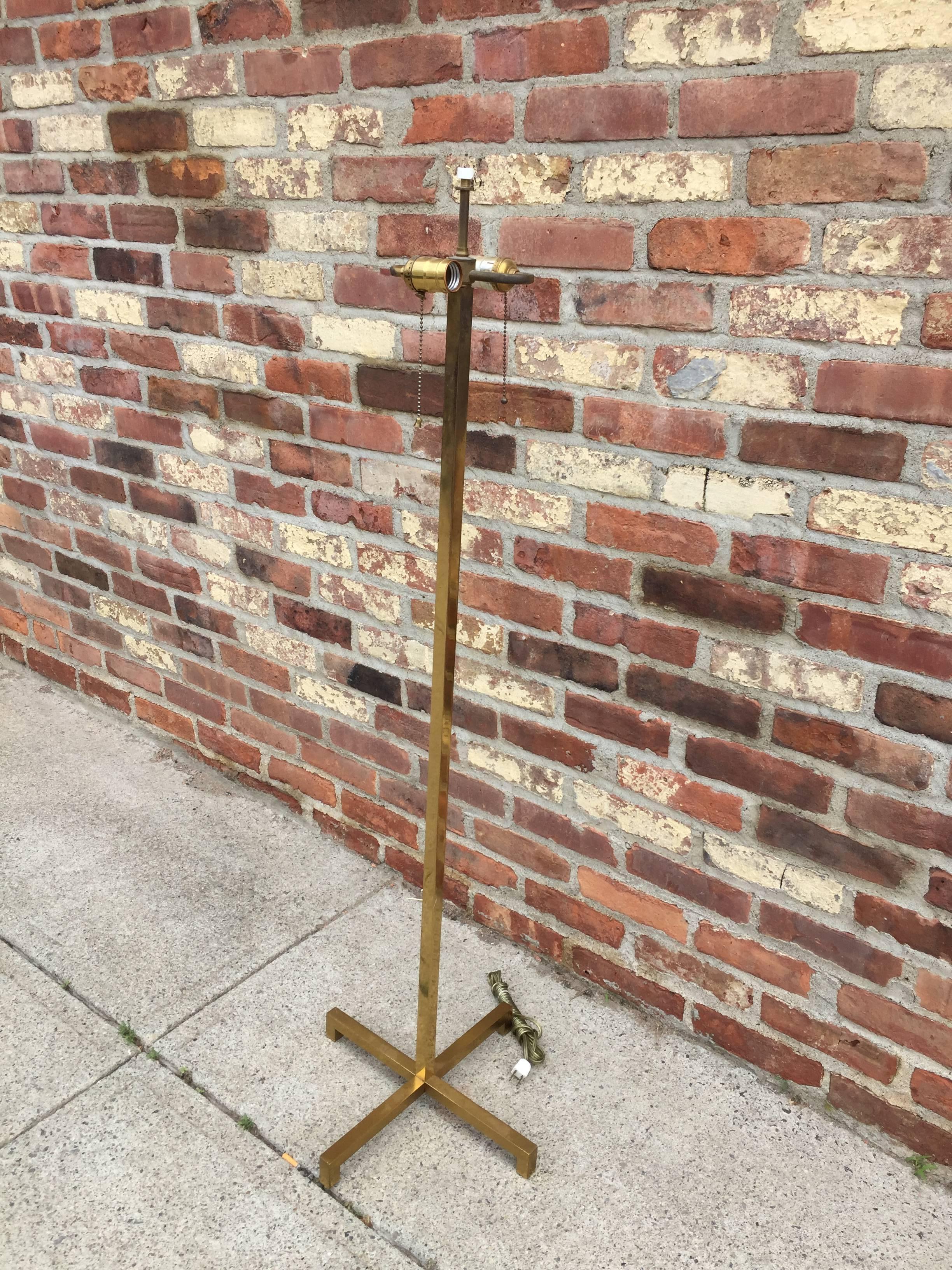 Solid brass with cruciform base for Hansen Lighting of New York. Beautiful old example of this simple and elegant design. Features two sockets with chain pulls and original diffuser with Hansen stamp.