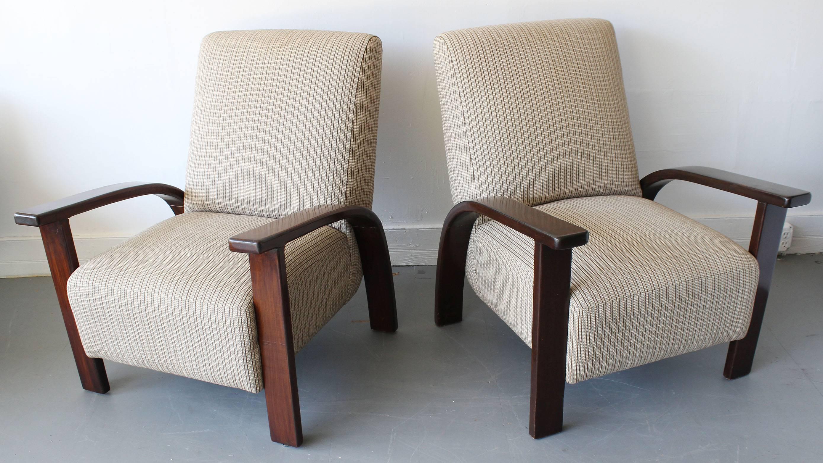 A handsome pair of bentwood mahogany French deco armchairs, upholstered in striped blend fabric.
 