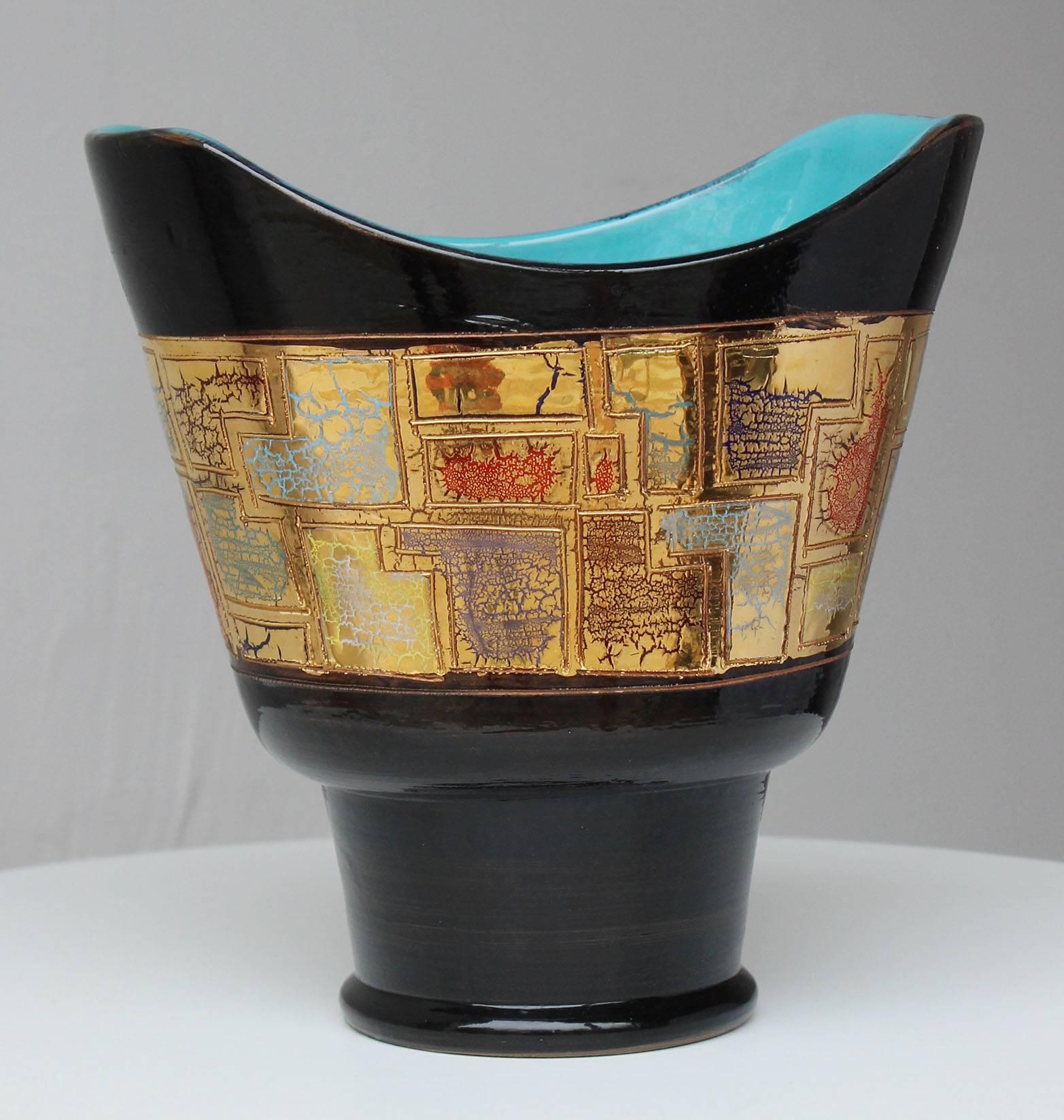 A gorgeous mid-century metallic gold crackle glaze band vase surrounded by sumptuous gloss black with turquoise interior.

