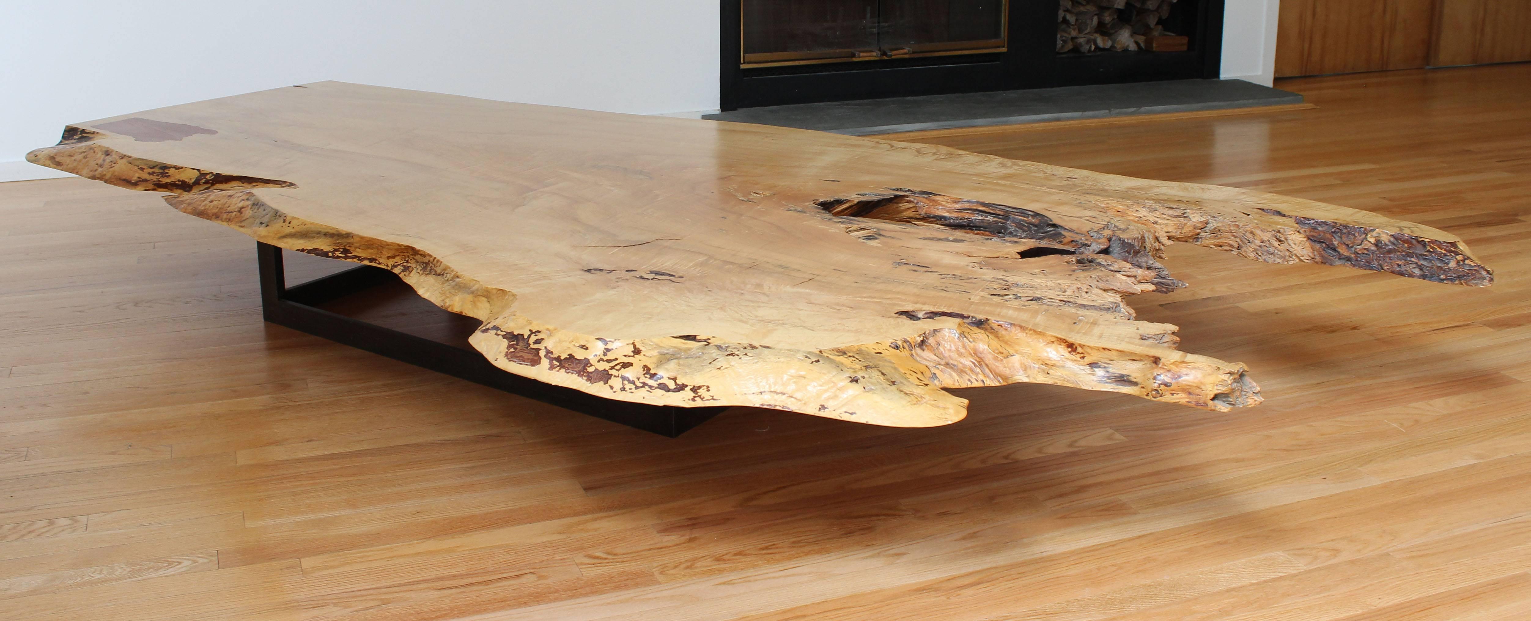 A unique and impressive, natural edge spalted maple coffee table on cold rolled steel base, designed by John Houshmand.

 