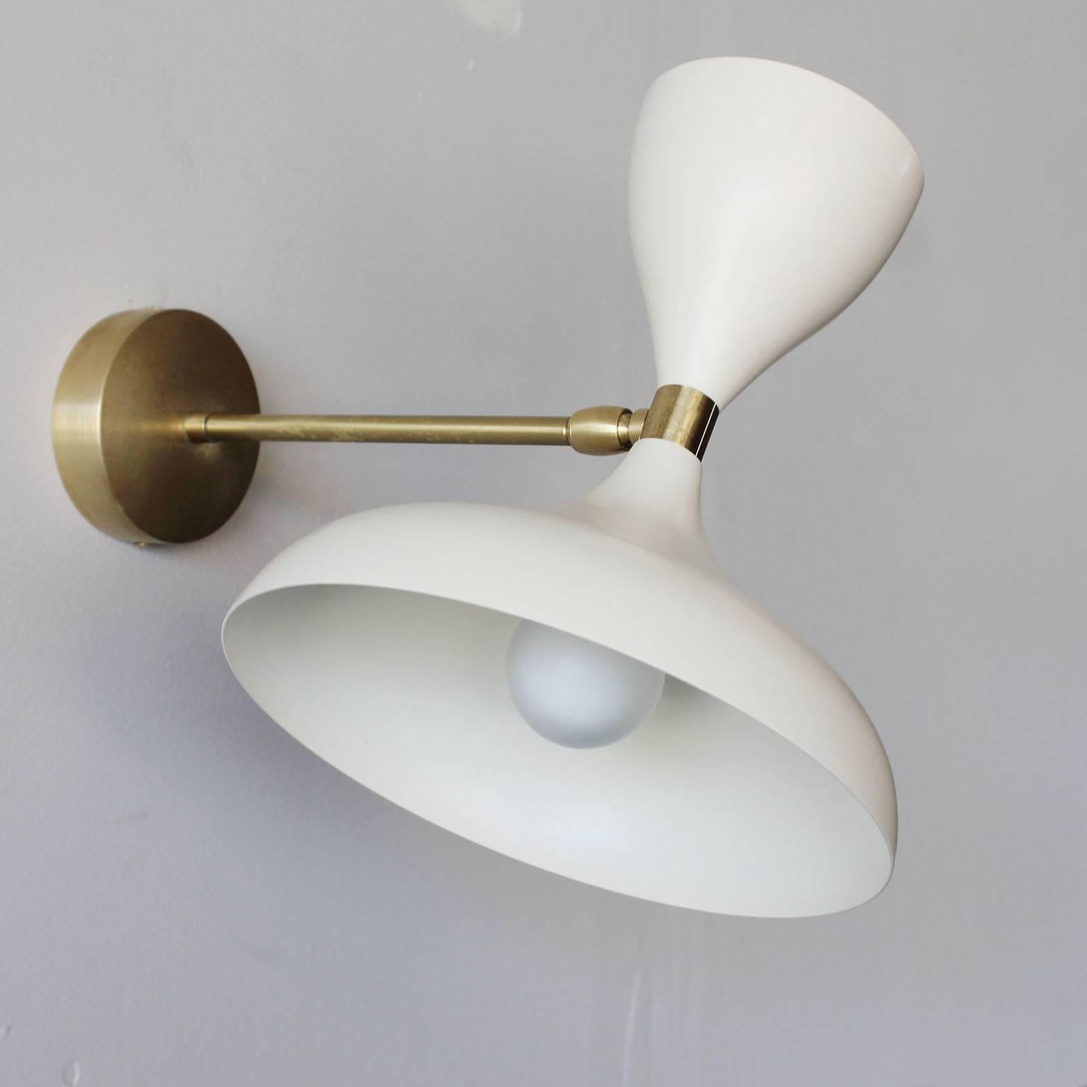 All new spun aluminium sconces in powder coated white with brass details. Heads fully rotate with up and down sockets. Stellar union exclusive design.

Lead time 6-8 weeks.