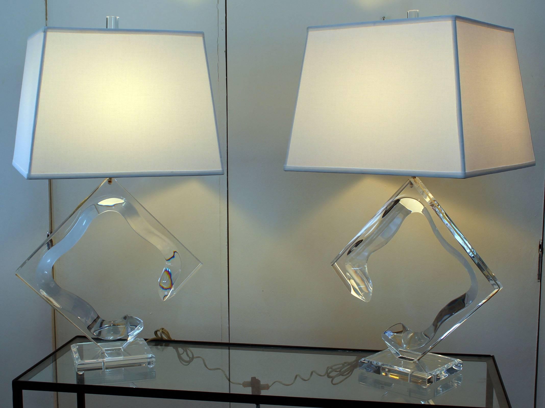 A pair of signed Van Teal Lucite lamps with Lucite finials. Shades for photo only.

20" high base -- to bottom of socket.