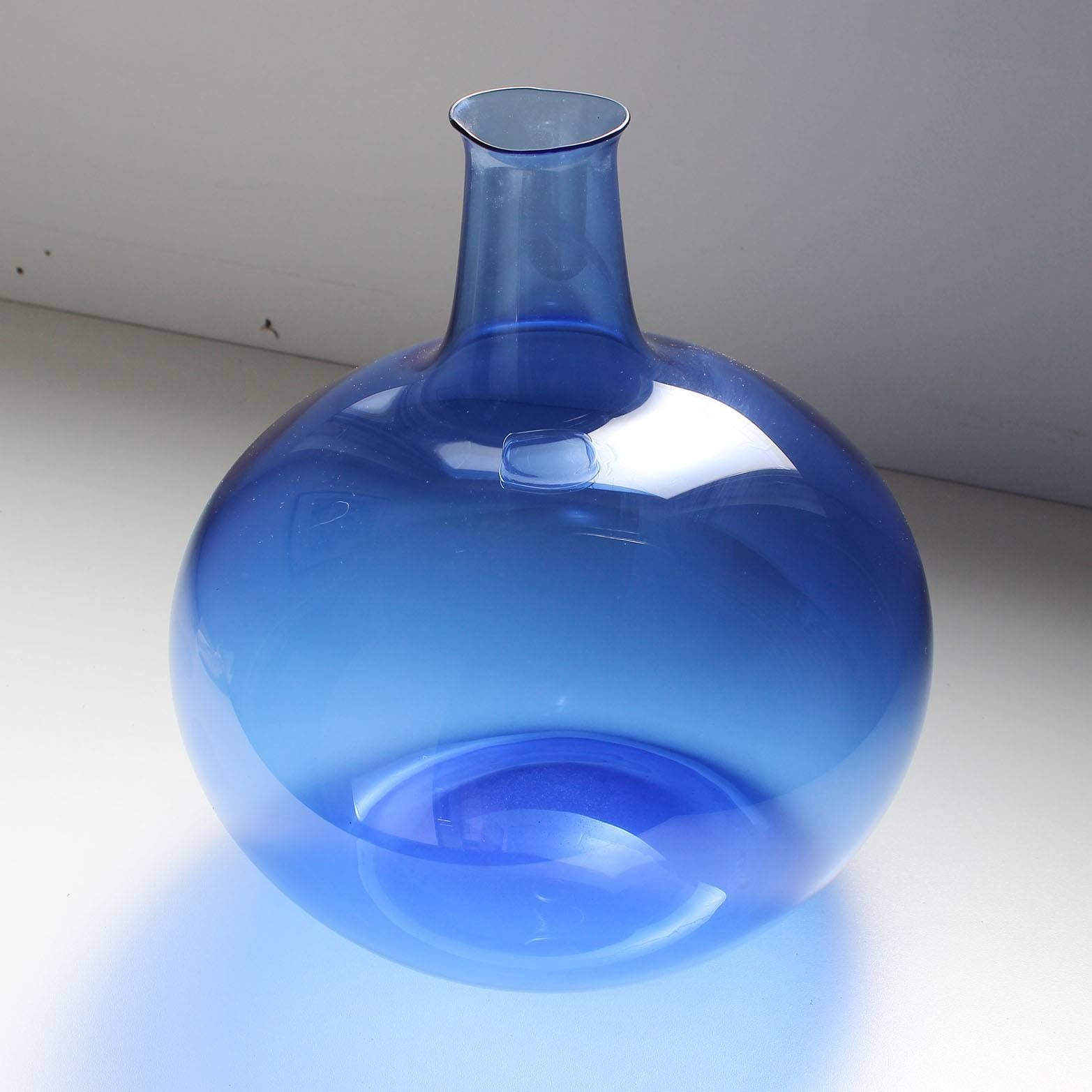 A translucent cobalt blue delicately blown glass Scandinavian decanter vase.
