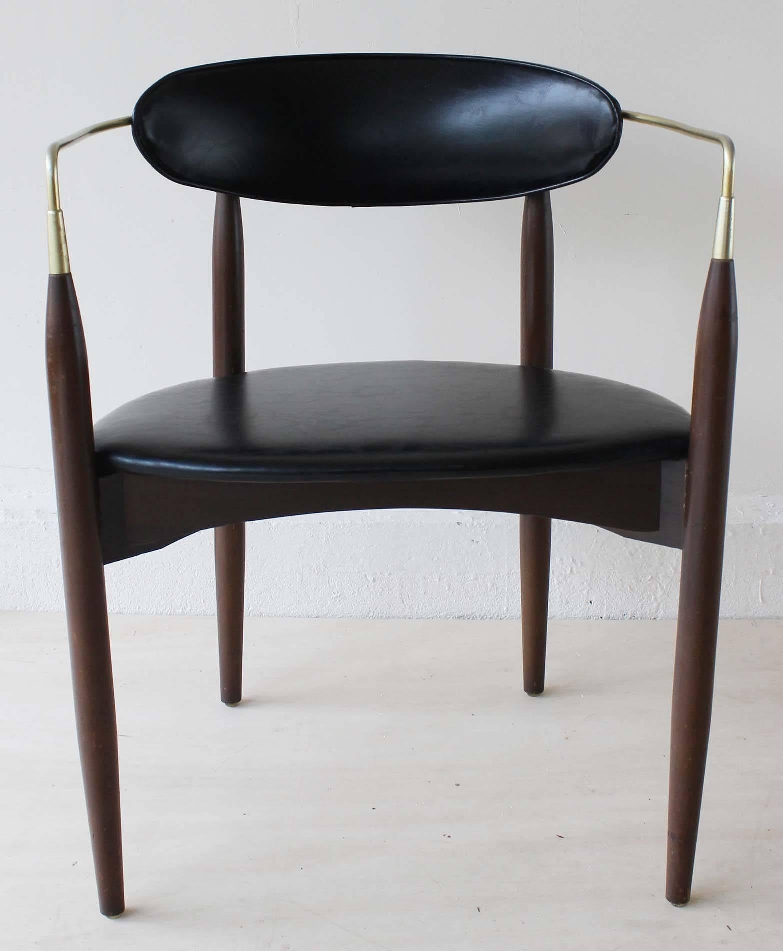 The Classic walnut and brass frame Viscount chair by Dan Johnson, circa 1950, in vinyl upholstery.