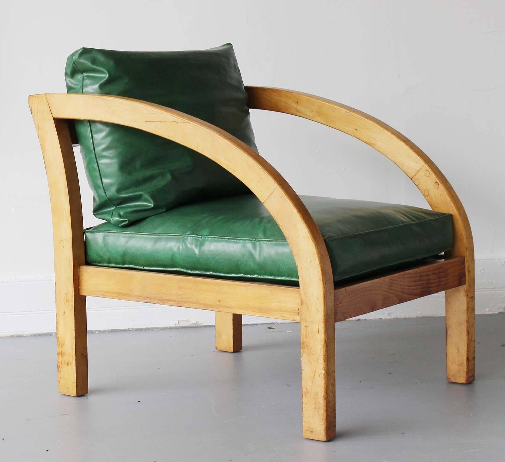 A Mid-Century deco Modernage D lounge chair in original upholstery, in the style of Paul Frankl.

Frame height 26.63 inches.