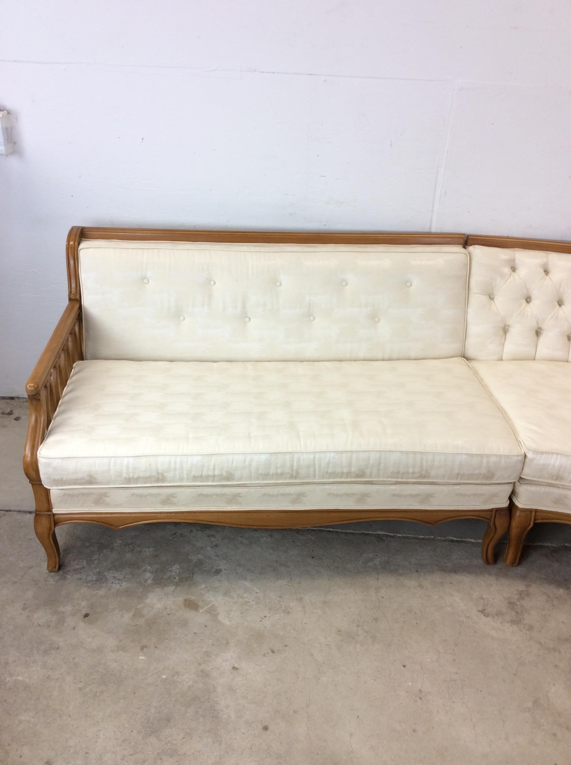 This mid century modern three piece sectional sofa features hardwood frame, vintage tufted upholstery, curved design atop tapered legs.  Individual dimensions: End pieces- 51.5w 34d 30h 17sh 22.5ah Curved piece- 68w 33d 30 17sh  87” from center of