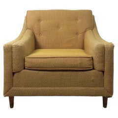 Sillón de estilo «Mid Century Modern» con tapizado amarillo vintage