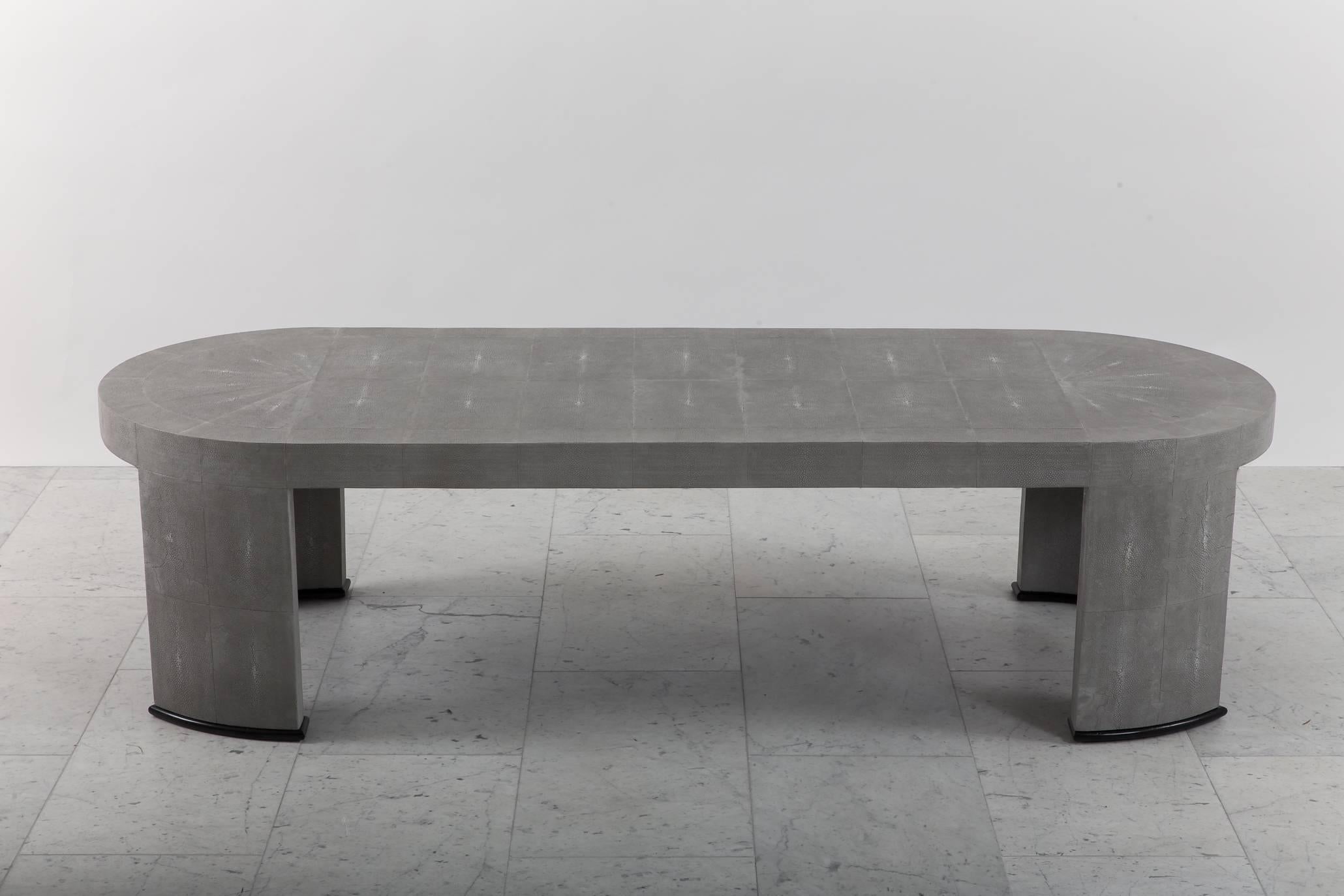 A long and elegant racetrack low table in grey shagreen with ebonized mahogany sabots. Epitomizing Seff’s masterful use of exotic skins and demure, curvaceous designs, the table is from the original production and is in excellent condition.

Todd