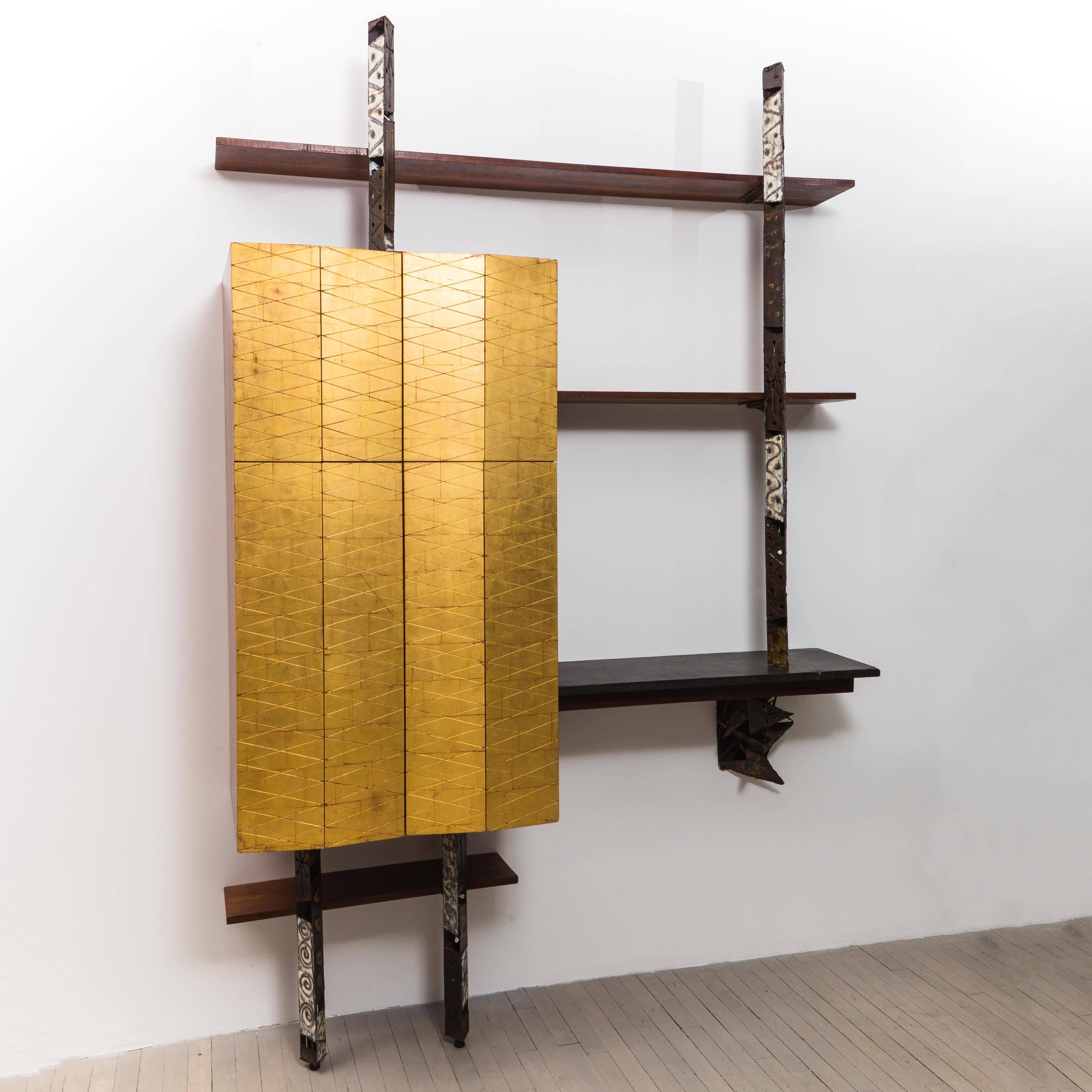 A custom commissioned bar cabinet and serving-shelf unit designed and handmade collaboratively by Phil Powell and Paul Evans, circa 1964. This is a fantastic and rare piece that represents the early creative partnership between the artists: with