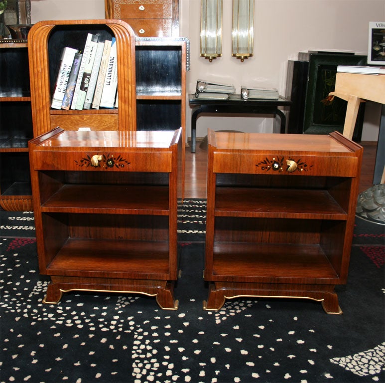 A pair of French Art Deco side tables, circa 1930s signed LELEU, in rosewood with mother of pearl inlaid.