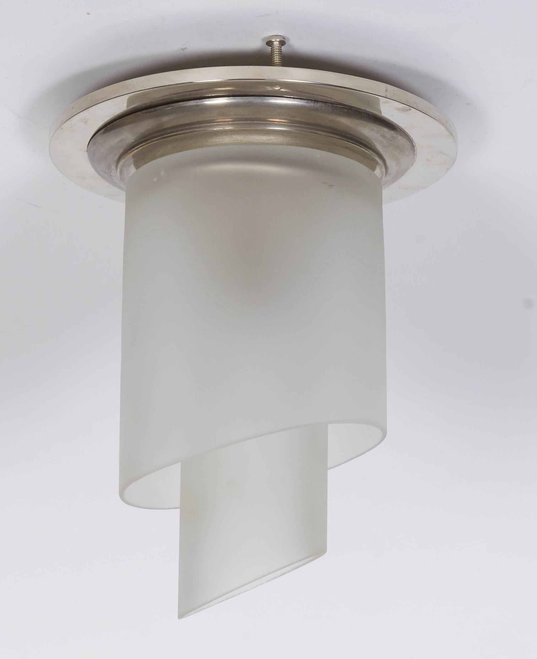 Perzel round flush mounted fixture.