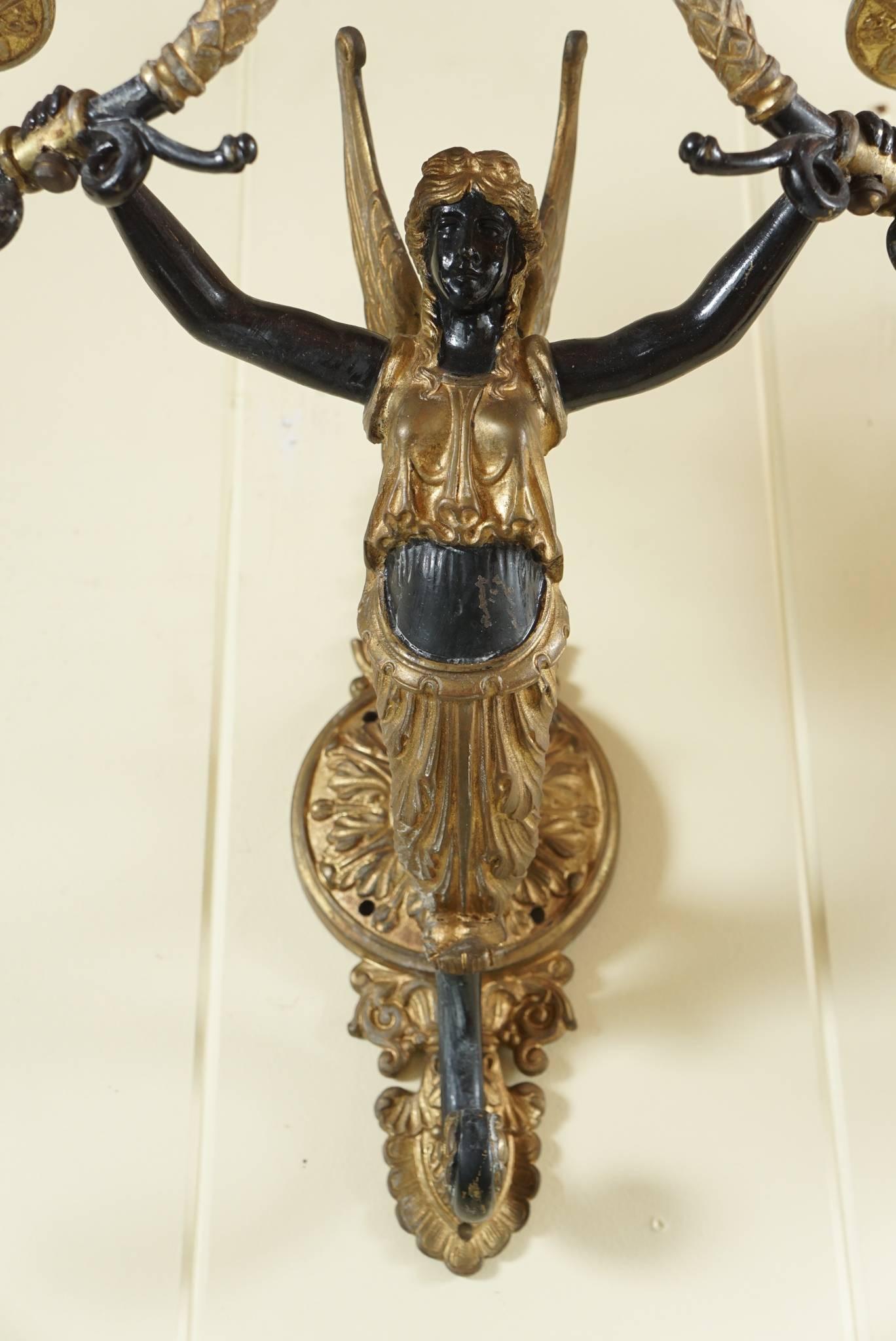 Early 20th Century Pair of Four Light Sconces in Bronze