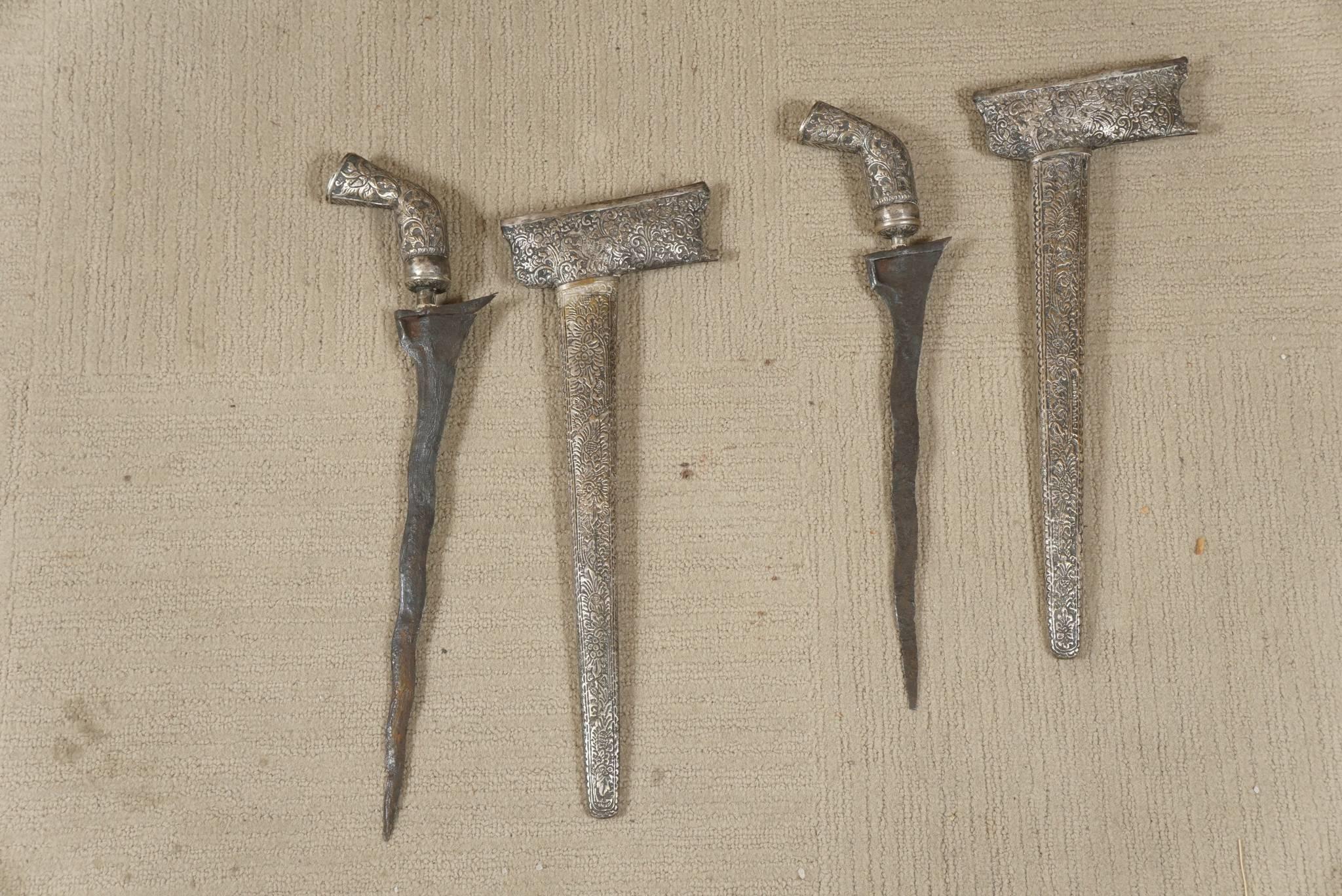 Pair of daggers from Malaysia - Keris Blades. With silver sheath. With silver handle.