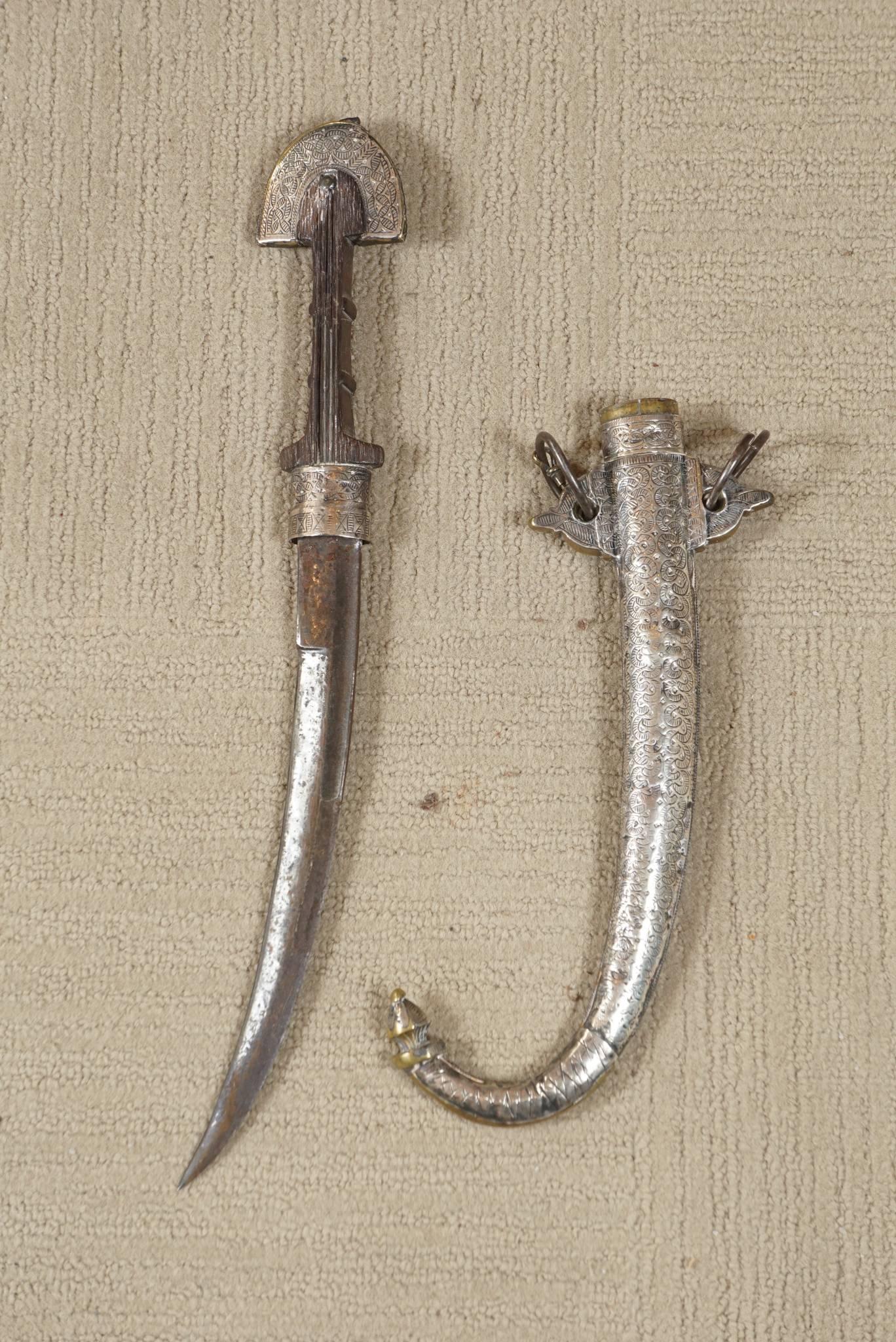 19th century Syrian dagger, with elaborate silver sheath, wooden handle.