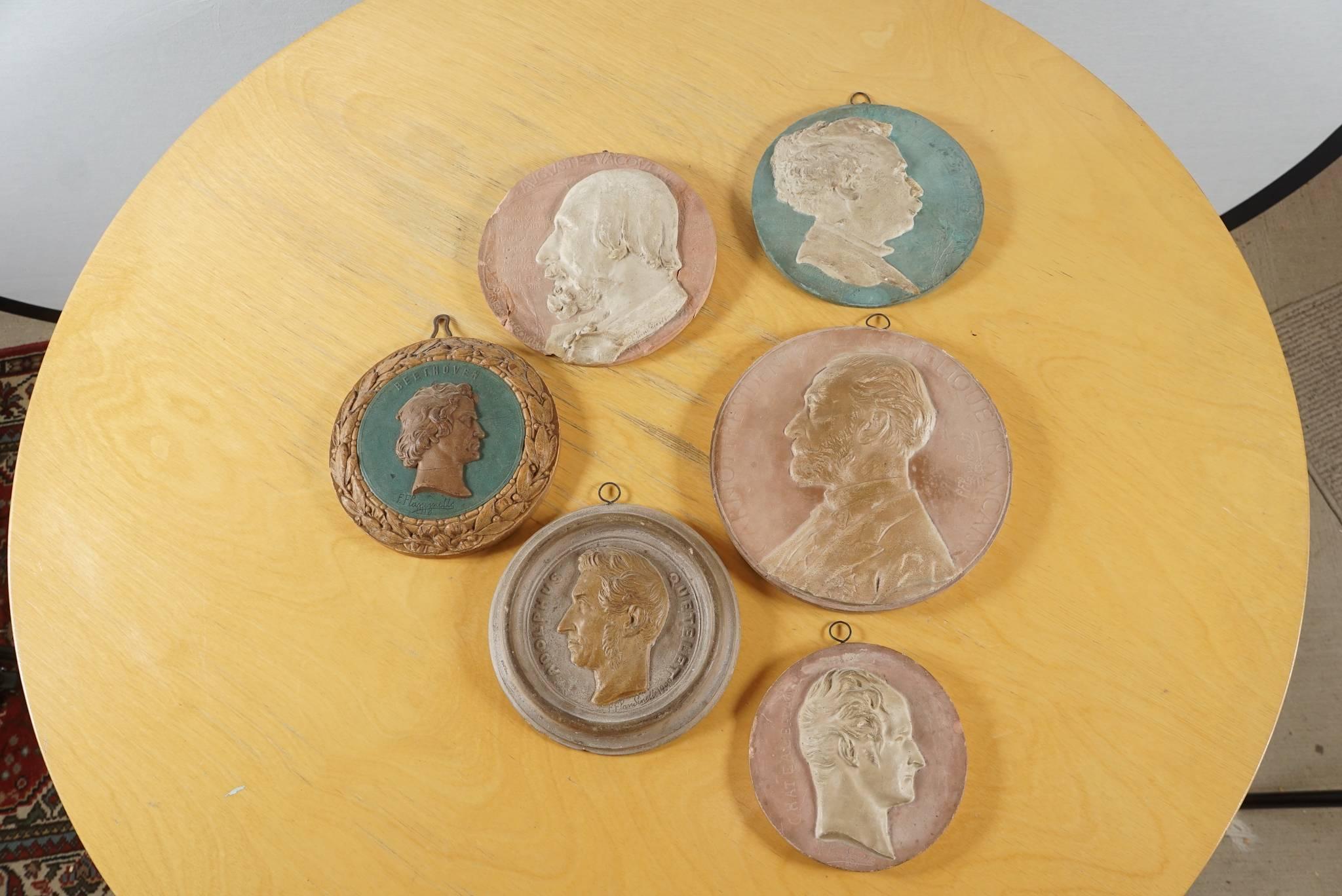 A set of Six Antique French Chalkware Cameo Plaques