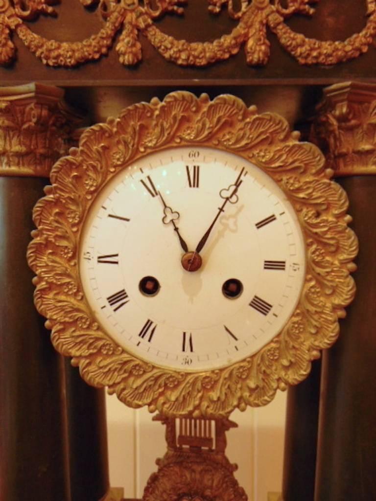 A French Empire style bronze clock by Tiffany & Co. from 1860 works, with key.