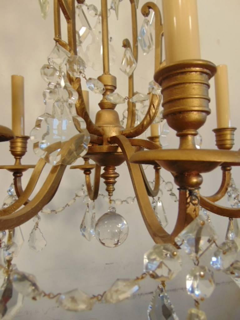 A bronze and crystal chandelier from France.