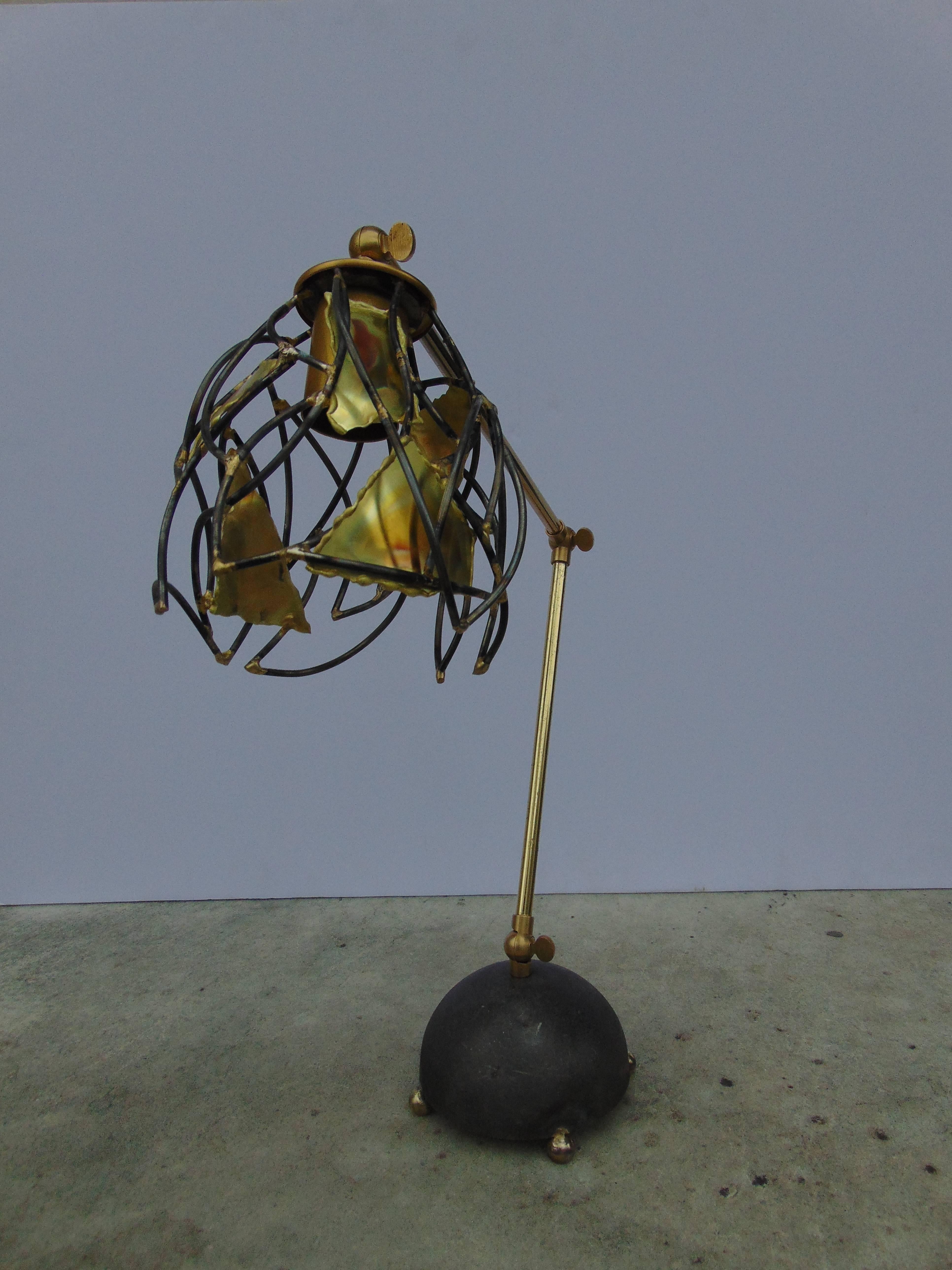 A one-of-the-kind table lamp by Lou Blass. Welded steel and bronze with brass details.
 