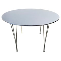 Mesa de comedor «Supercircular», diseñada por Piet Hein, Bruno Mathsson y Arne Jacobsen para Frit
