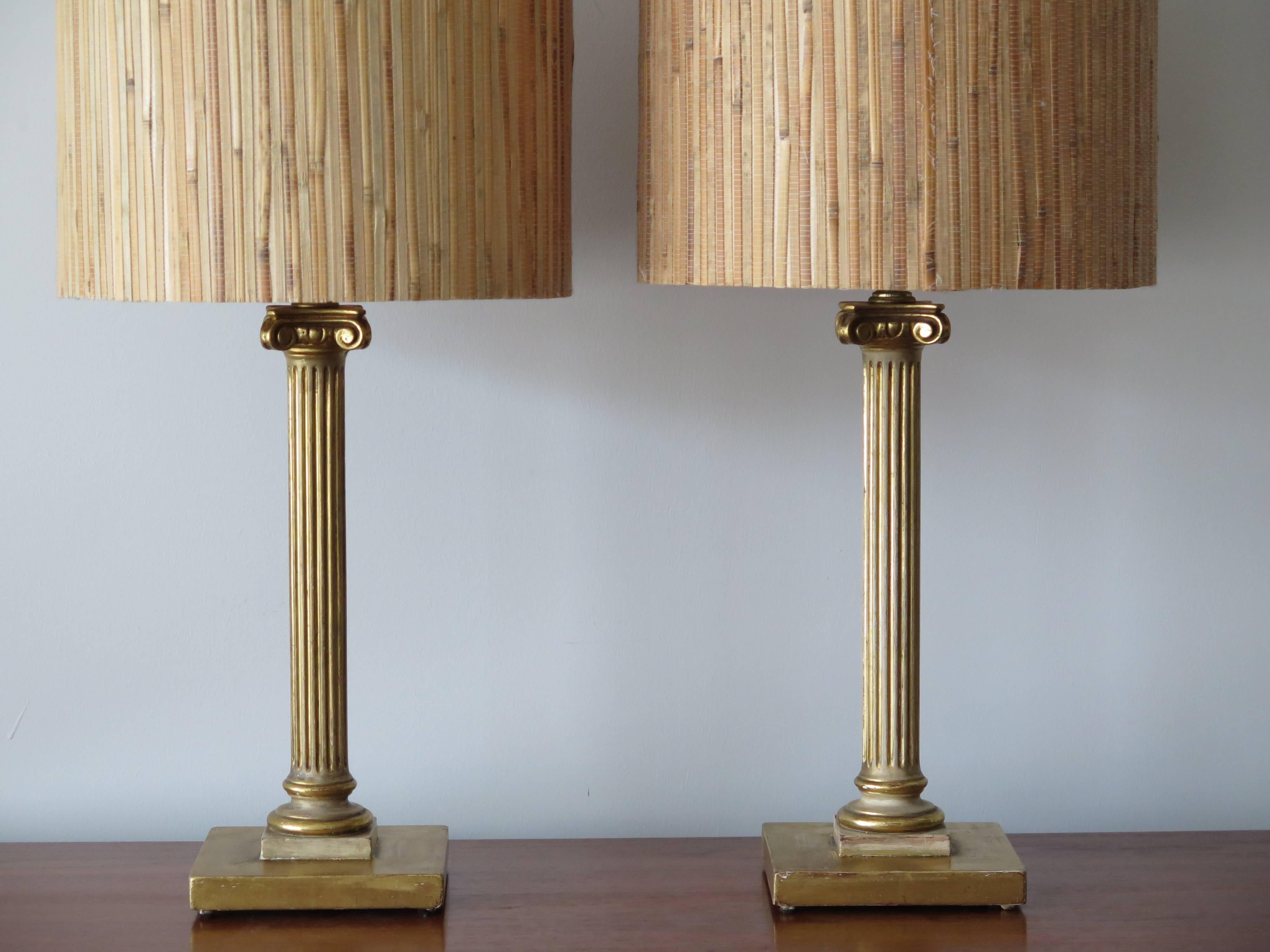 A pair of vintage 1940s Maison Jansen table lamps. Giltwood, original sockets, shades replaced.
