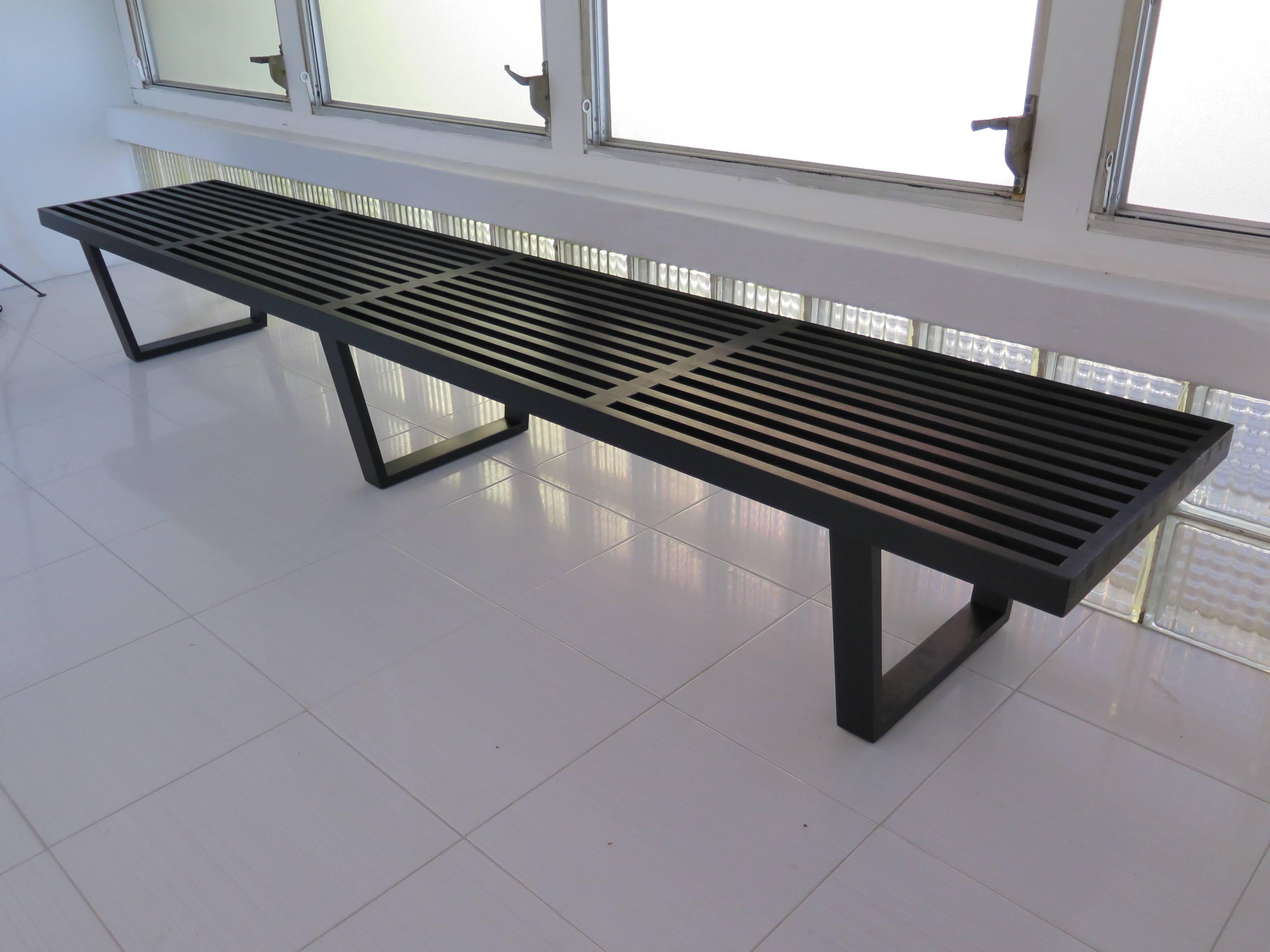 A Classic George Nelson slat bench-8 ft long. Finished in black with original label.