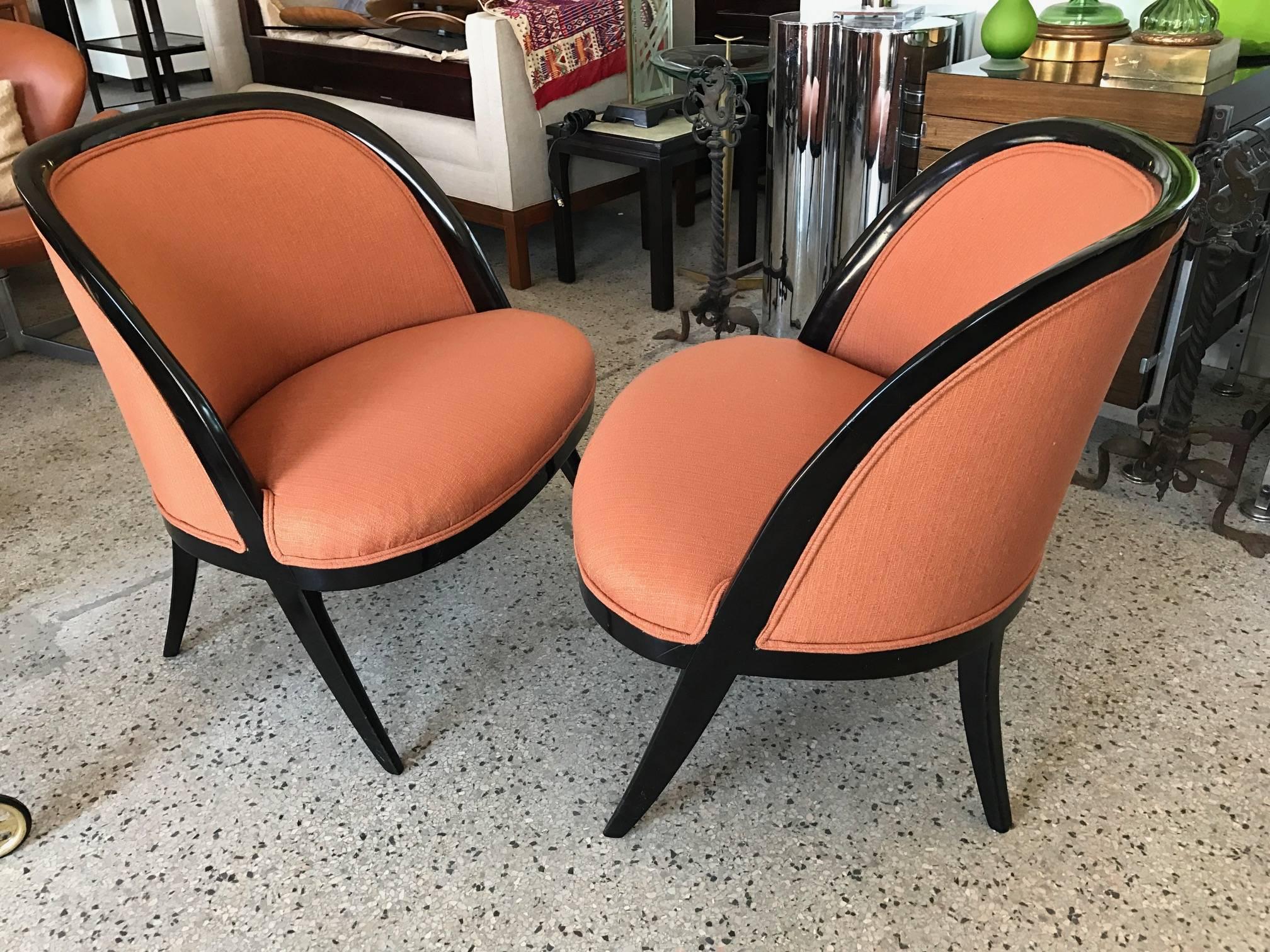 A pair of elegant slipper chairs in the style of Harvey Probber, circa 1950s.