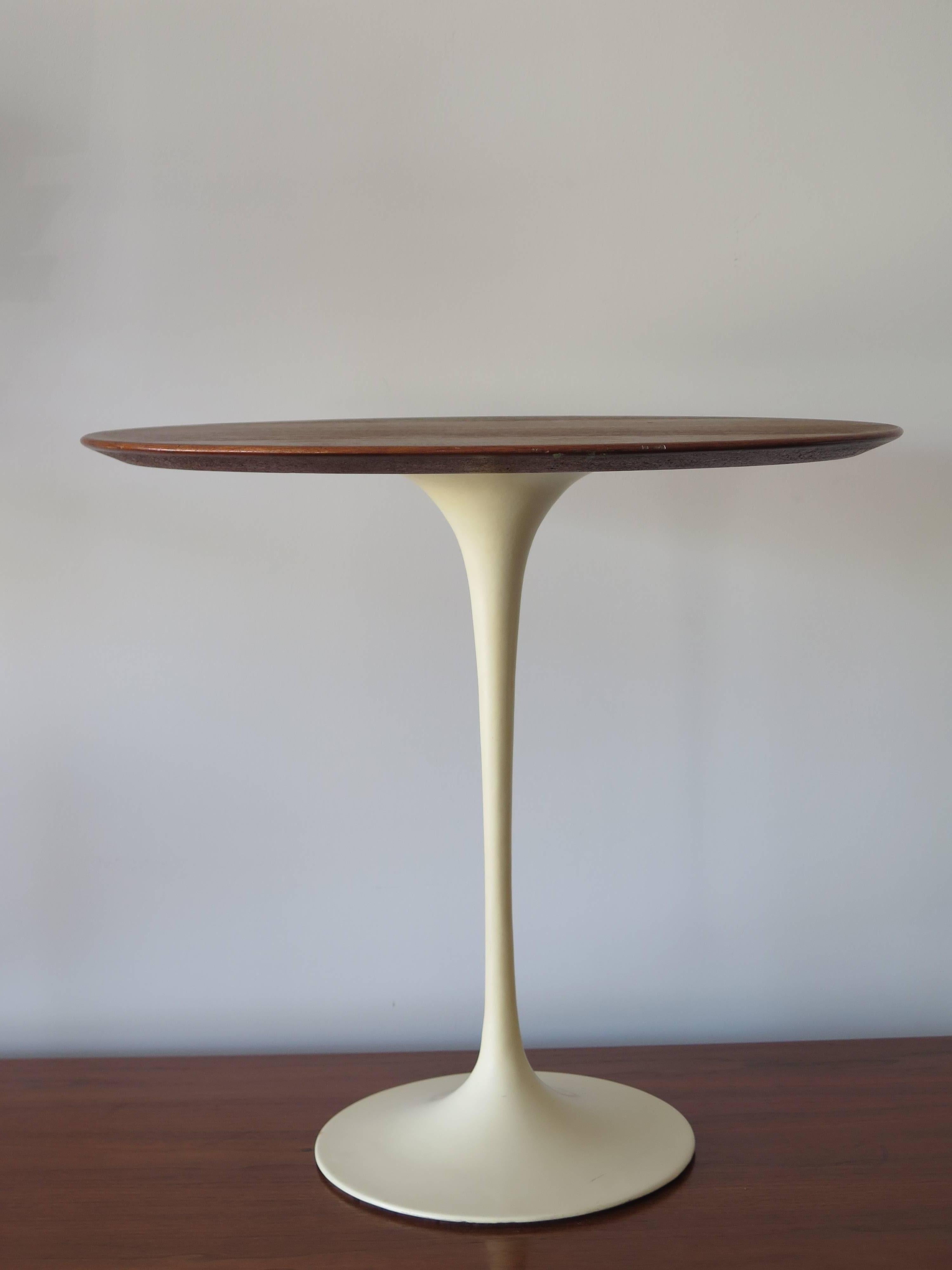 A Classic elliptical top, walnut side table by Eero Saarinen for Knoll. Nice patina, early label. Base has a warm patina.