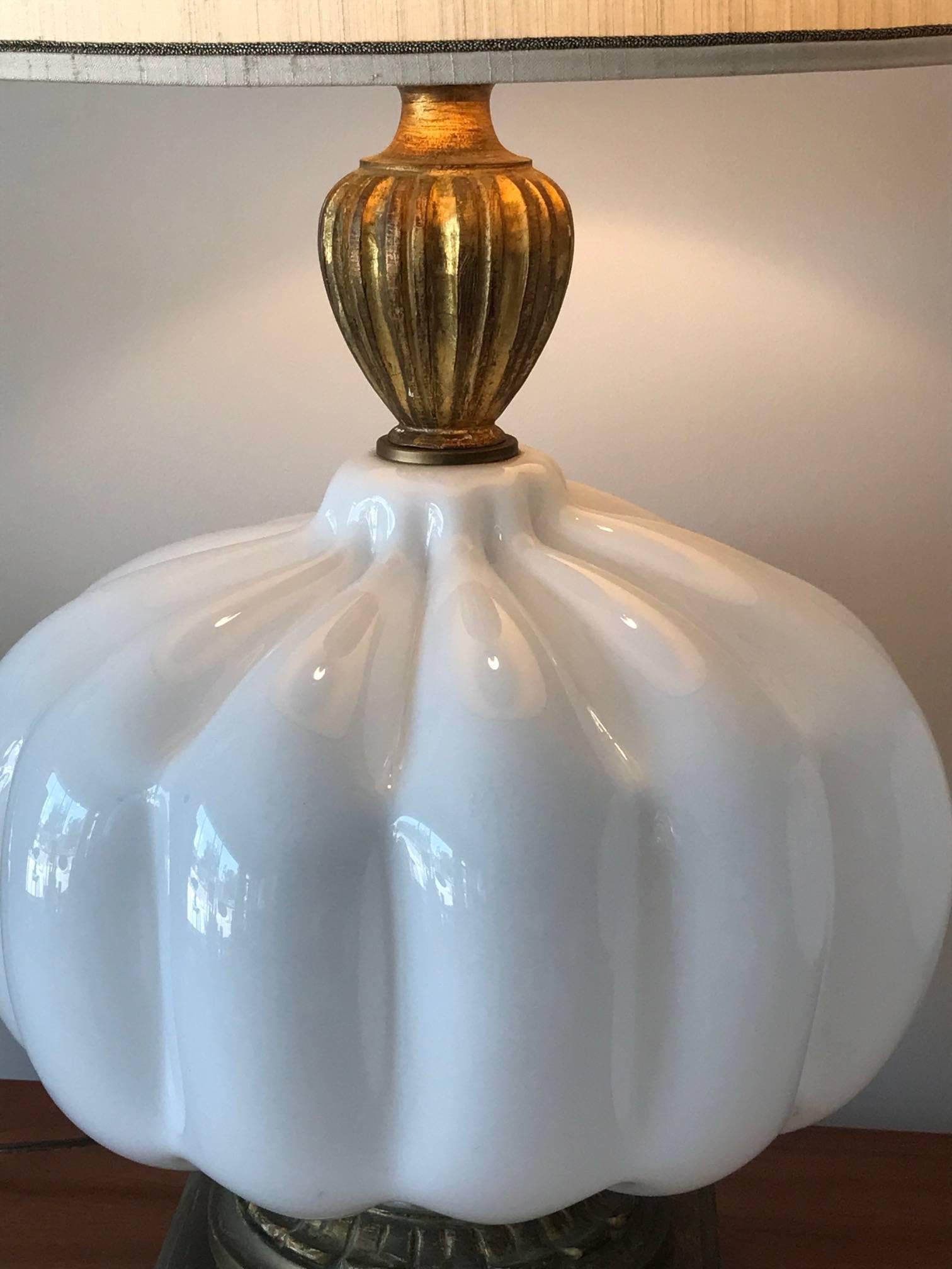 A pair of unusual, white -cased glass lamps. Italian circa 1960s. Large-scale and impressive-glass alone measures approx. 15