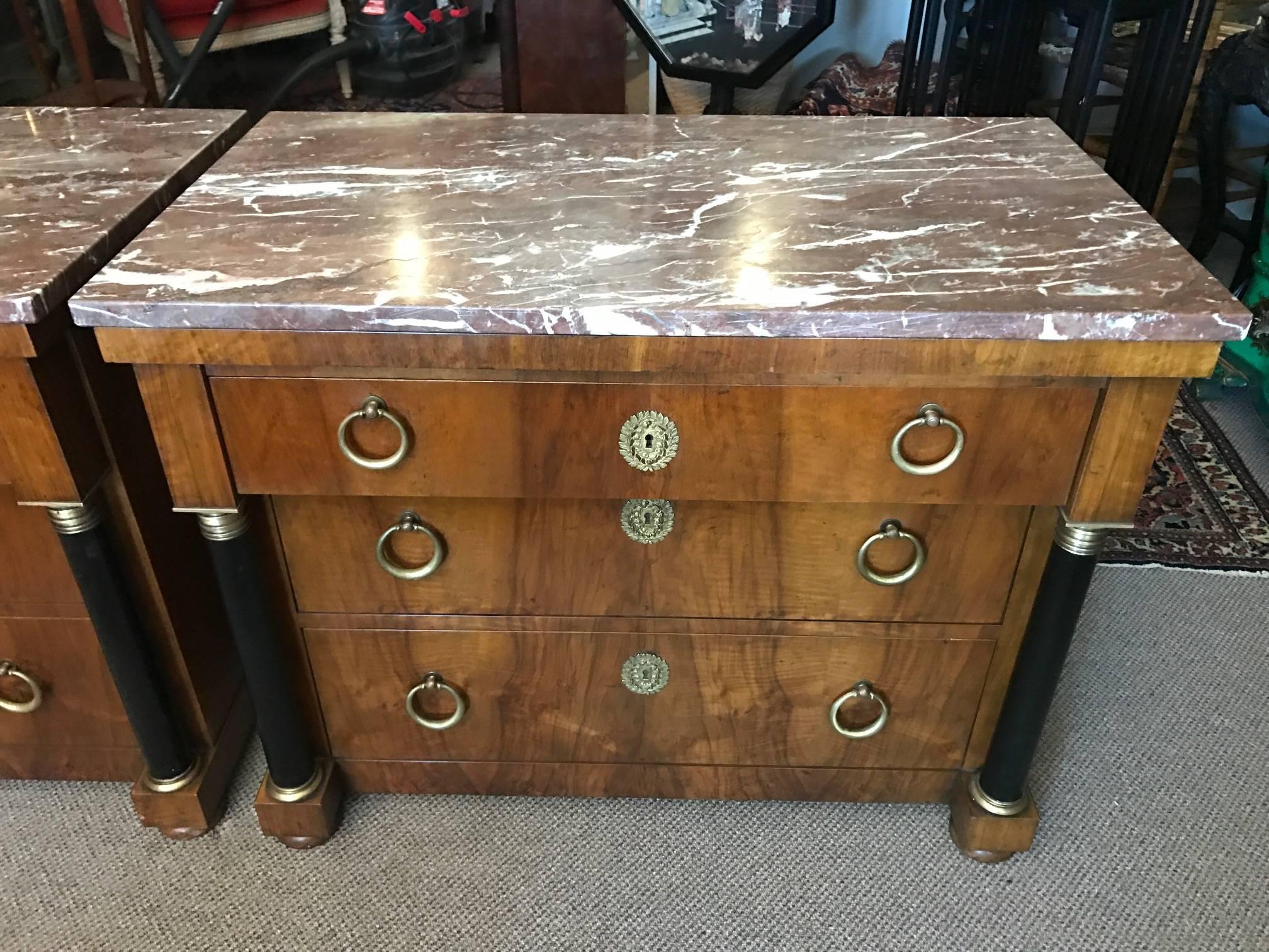 A pair of beautiful, Empire style chests by Baker. Original hardware, finished tops-could be used with marble or without. Nicely scaled- 32
