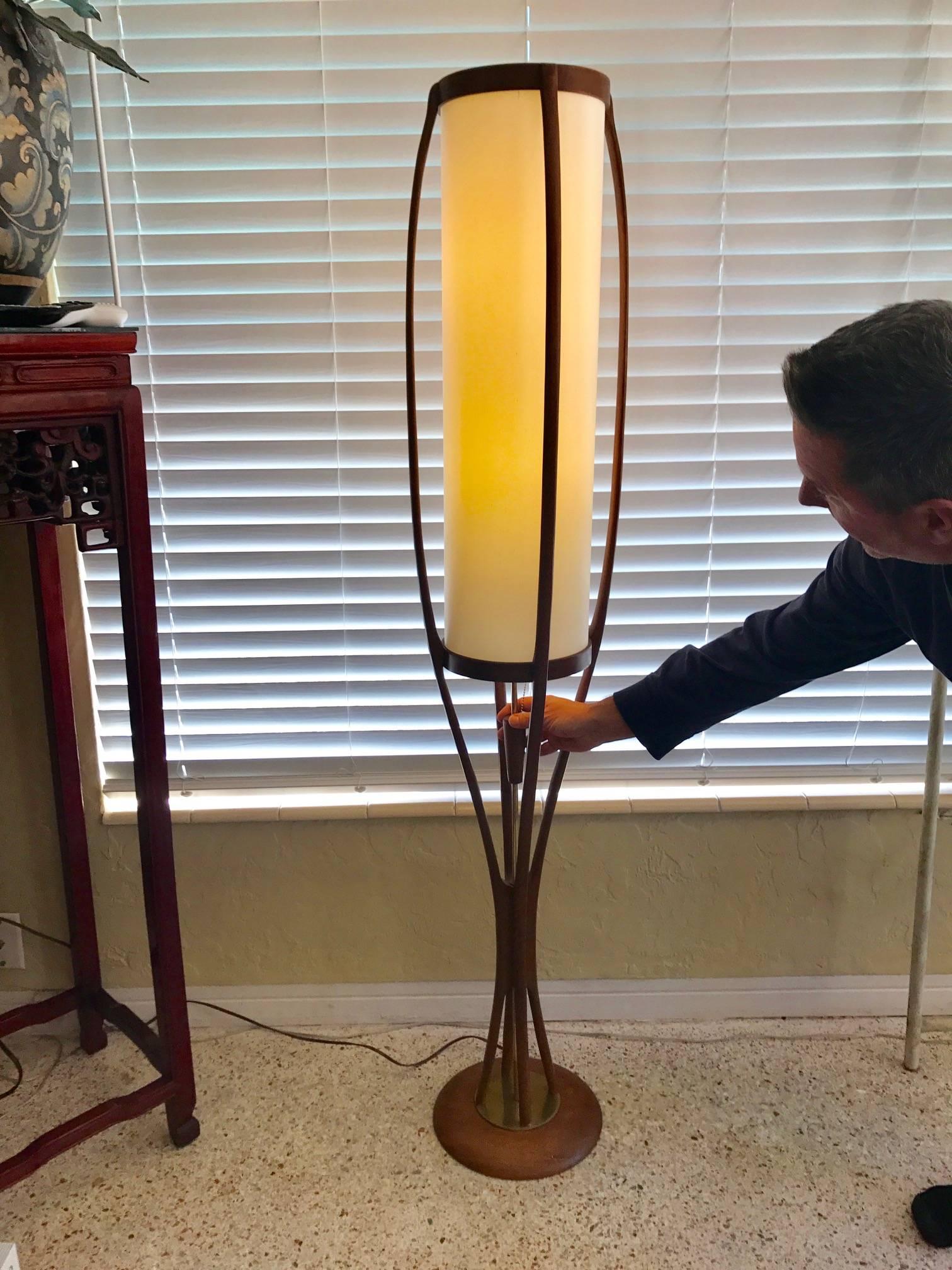 An unusual floor lamp by Modeline. Walnut, organic design with a sculptural feel. Shade replaced and rewired.