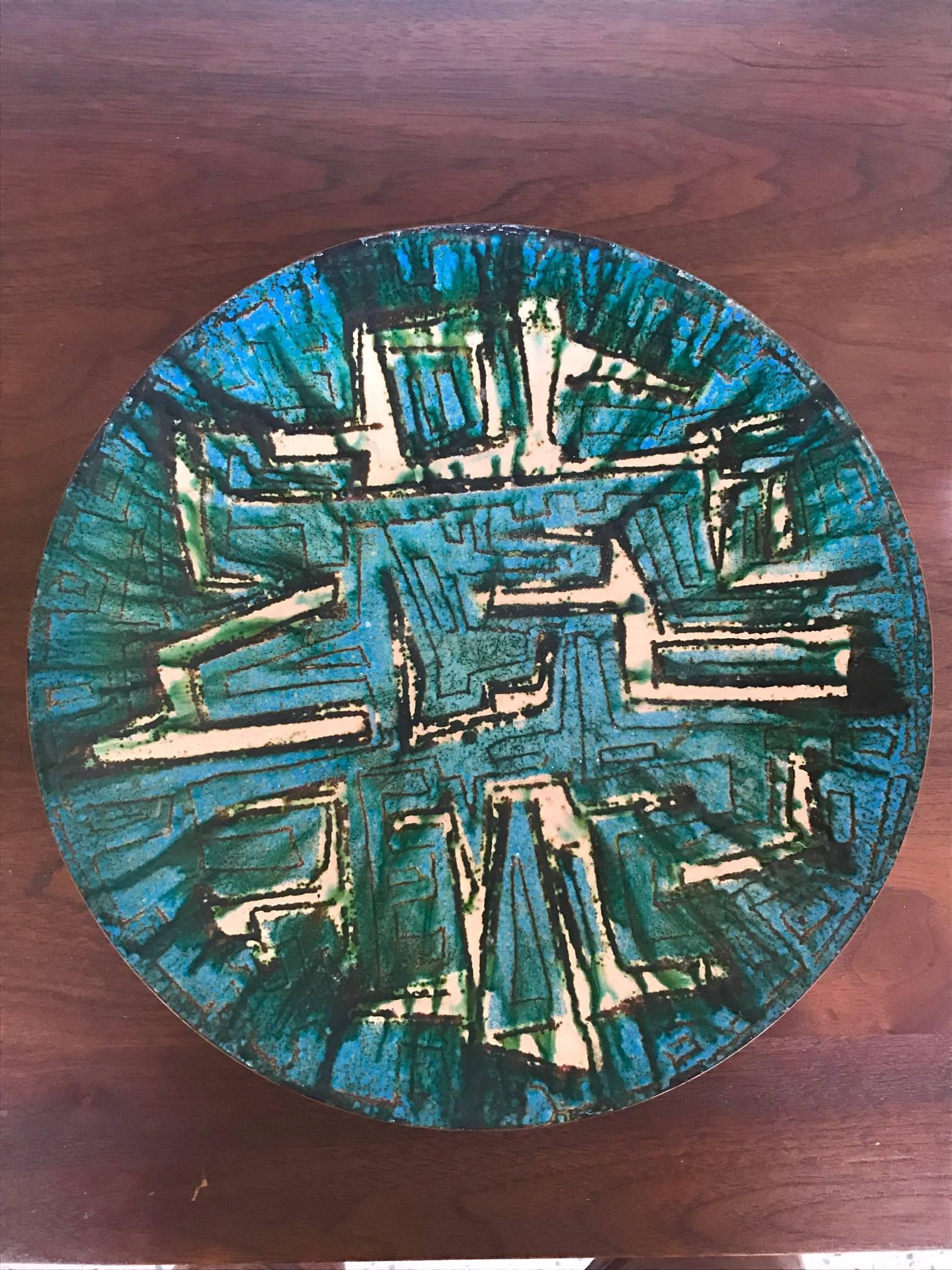 A fantastic and unusual Italian enamel on copper, signed VFN. Great example of midcentury Italian modern style. Large scale-diameter approx. 12.25
